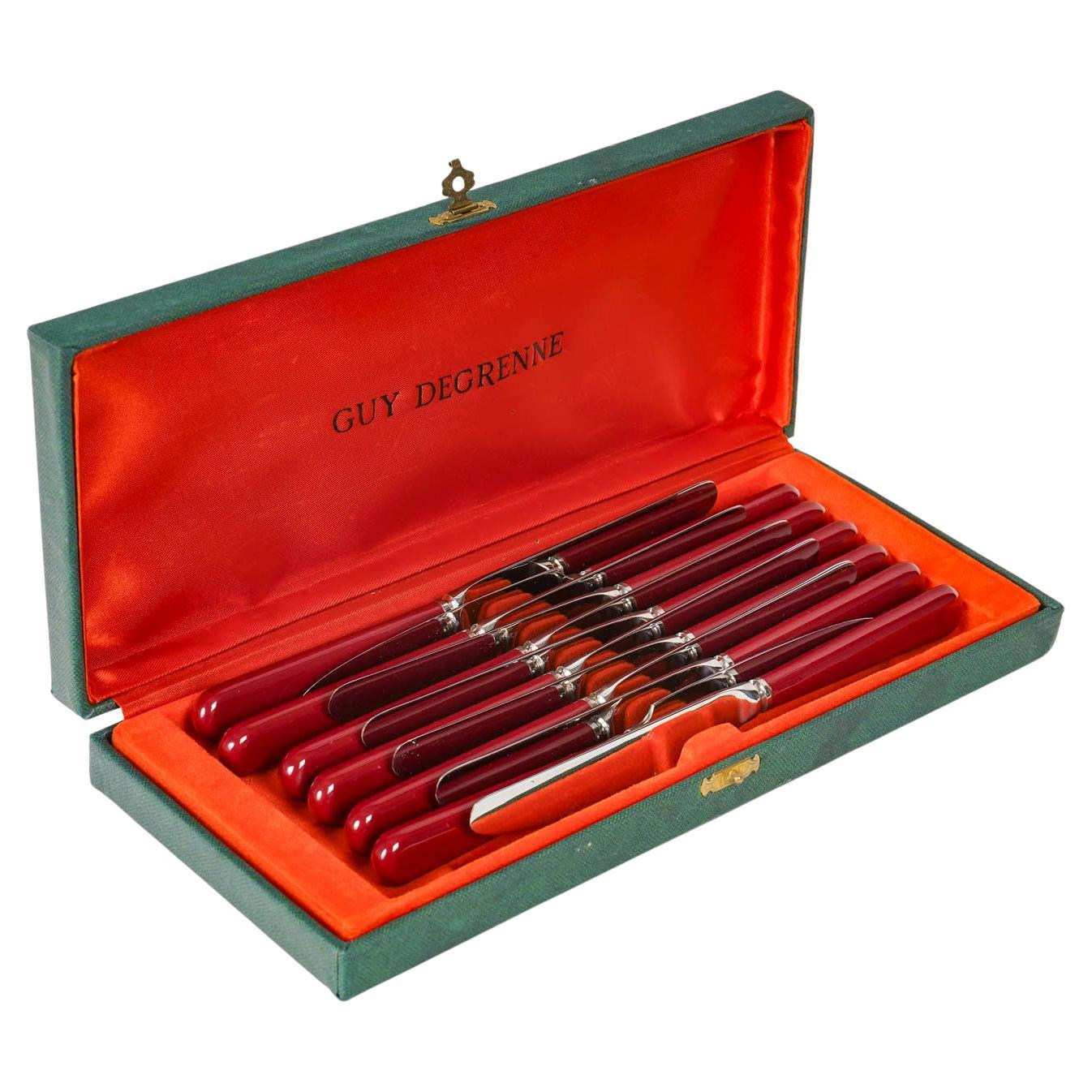 Juego de 12 cuchillos de postre Guy Degrenne, Siglo XX.