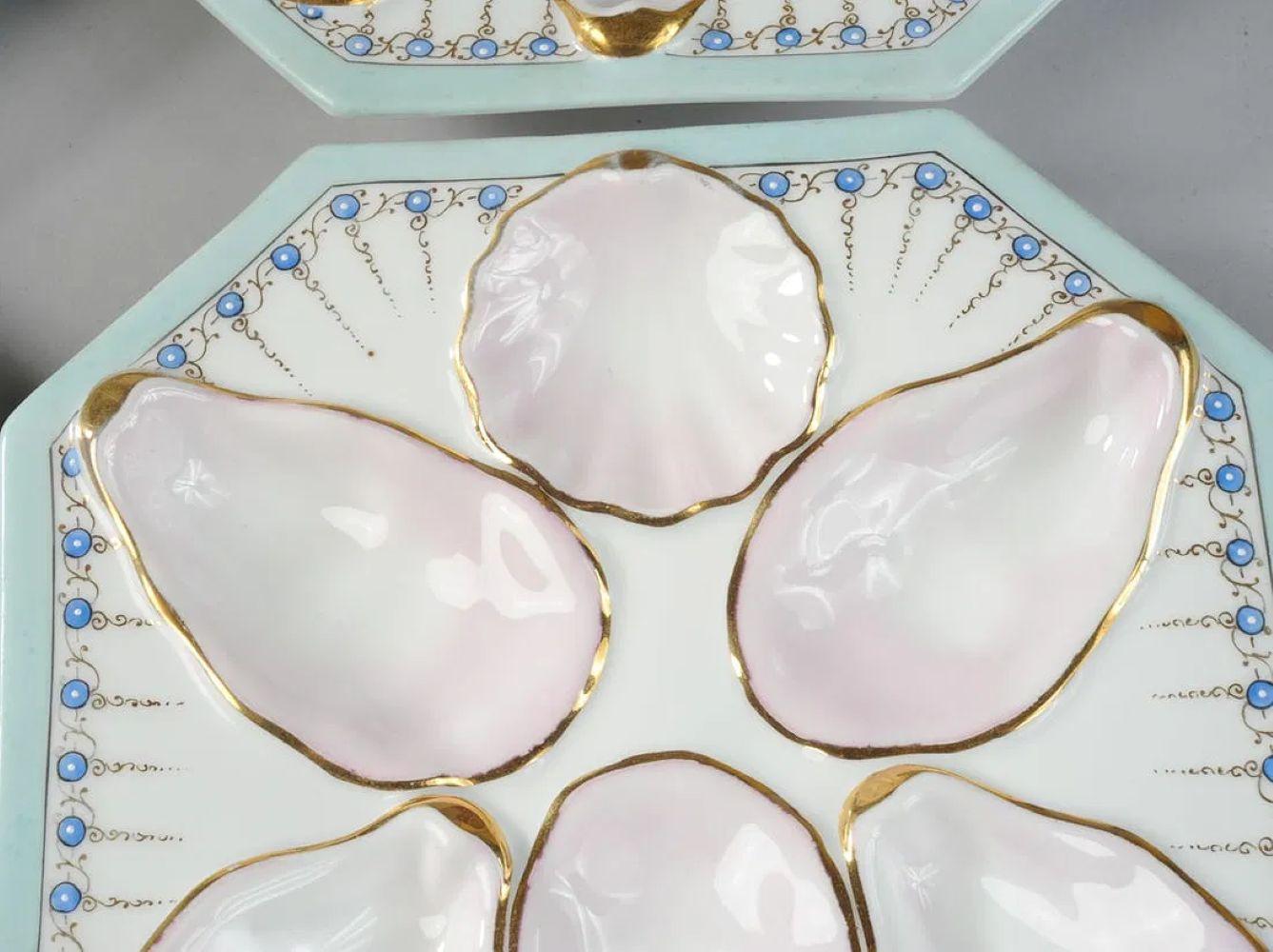 Allemand Ensemble de 12 assiettes à huîtres en porcelaine peinte à la main, fin du 19e ou début du 20e siècle en vente
