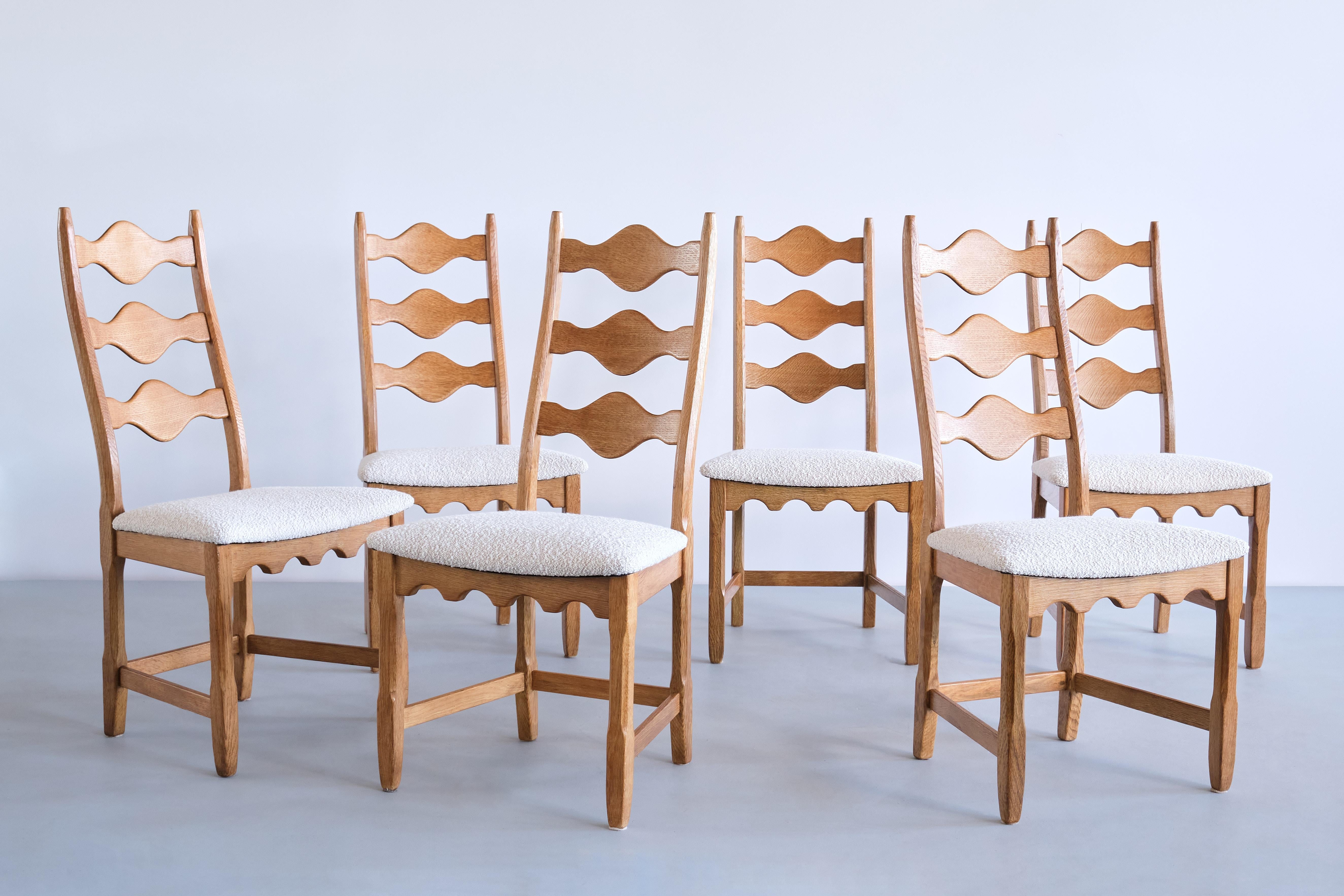 This striking set of twelve dining chairs was designed by Henning (Henry) Kjærnulf in the 1960s. The chairs were produced by Nyrup Møbelfabrik in Denmark and form a rare variant on Kjærnulf 'Razorblade' series 

The set consists of twelve chairs