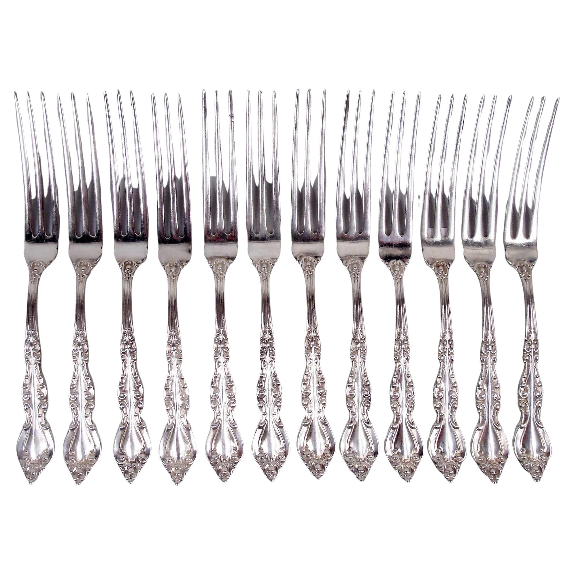Ensemble de 12 fourchettes à fraise en argent sterling International Warwick