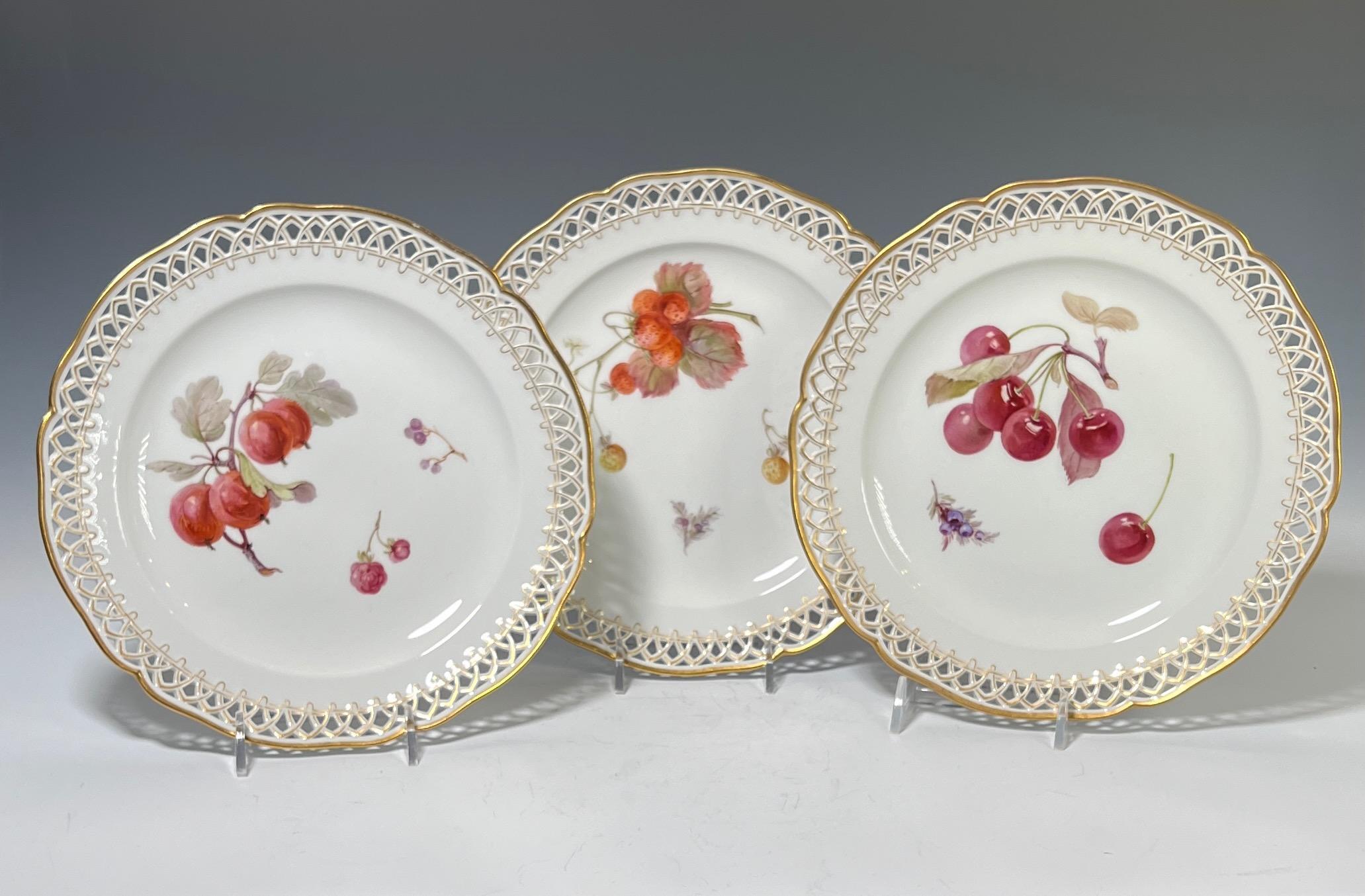Set of 12 KPM Dessert Plates with Hand Painted Fruit Pierced & Gilt Borders In Excellent Condition For Sale In Great Barrington, MA