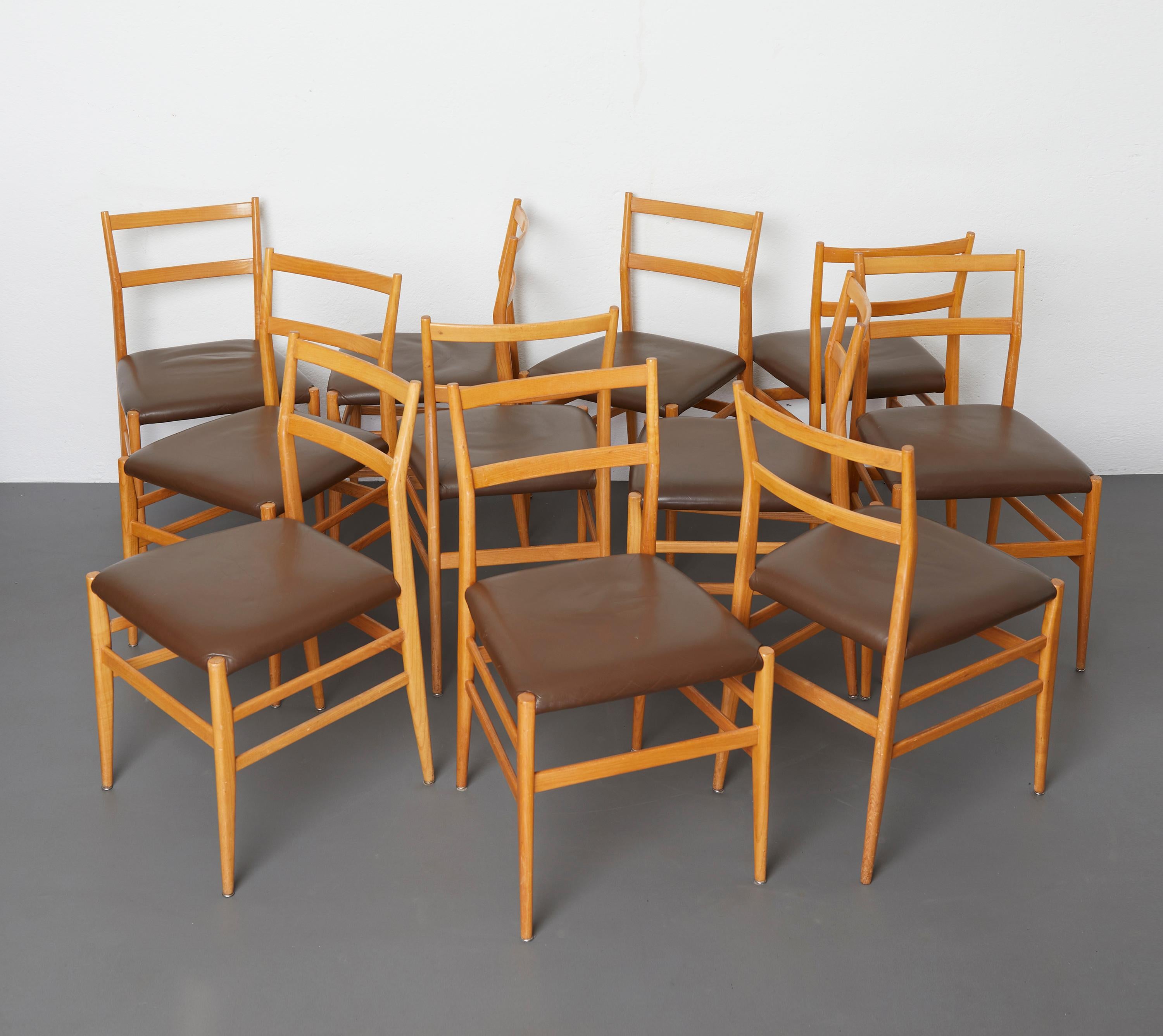 Set of 12 Leggera dining chairs in ash wood and leather by Gio Ponti for Cassina

These iconic chairs are the model 646 
