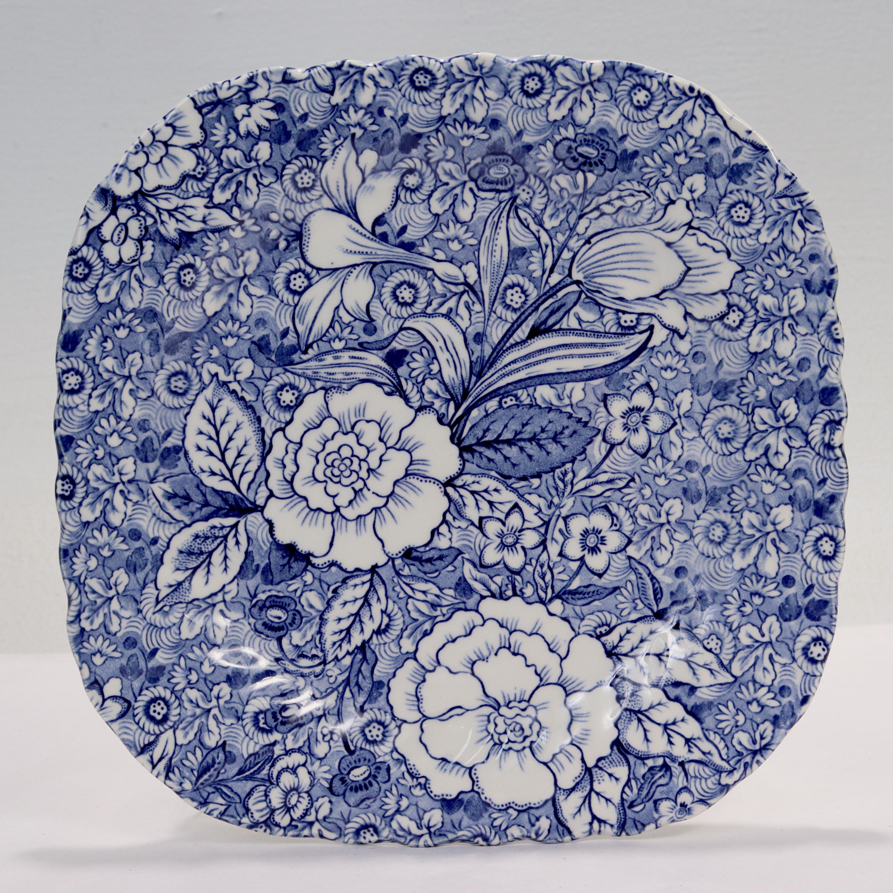 A fine set of chintz patterned ironstone plates by Johnson Brothers.

Made for Tiffany & Co.

This ornate blue floral chintz pattern is entitled 'Liberty'. 

These square plates serve as either salad or luncheon plates.

Perfect for the