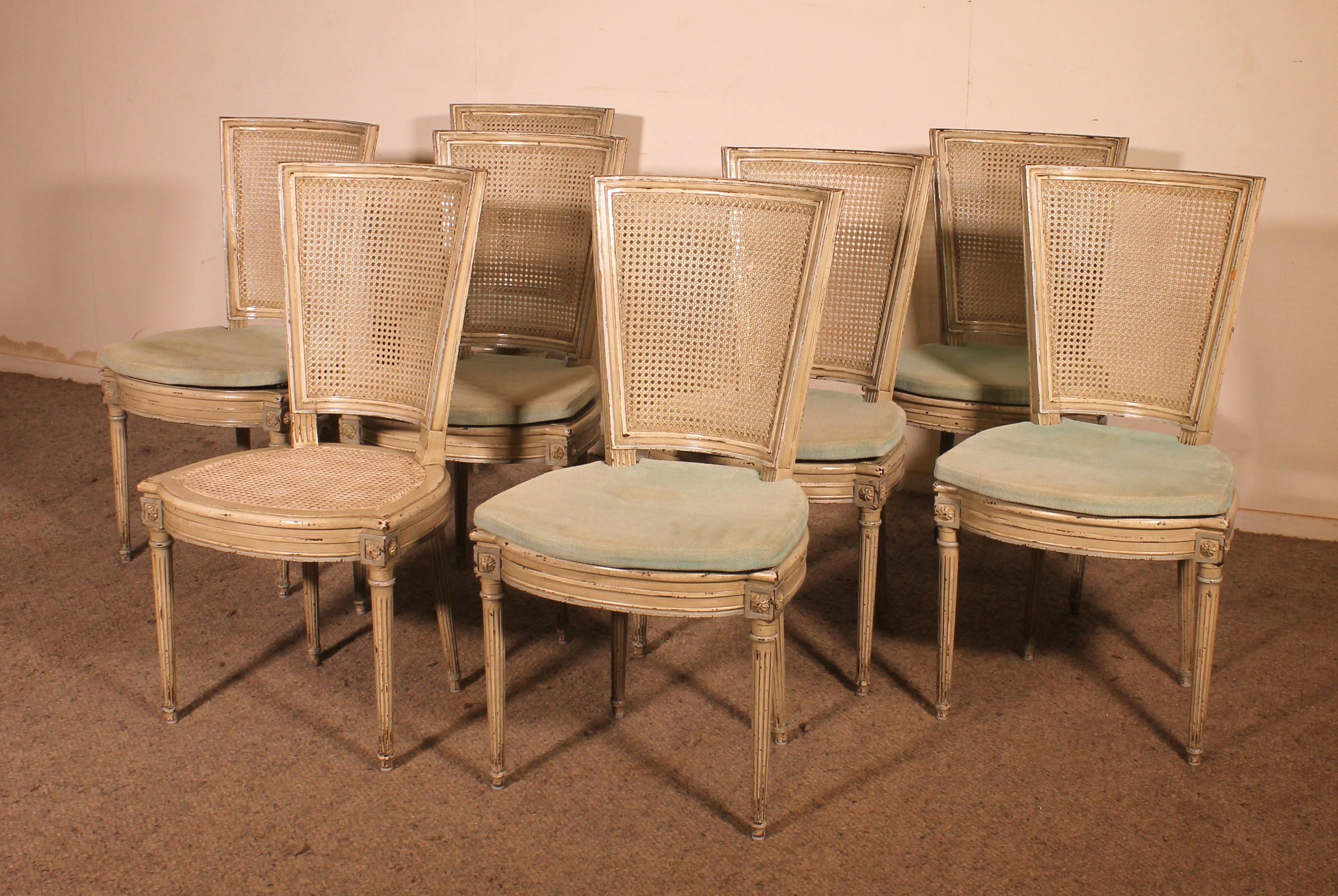 superb set of 12 Louis XVI style chairs from the Napoleon III period in polychrome wood

Very beautiful set which has a superb polychromie

trapezoidal backrest and fluted front and rear legs

The caning is in perfect condition
.Very beautiful