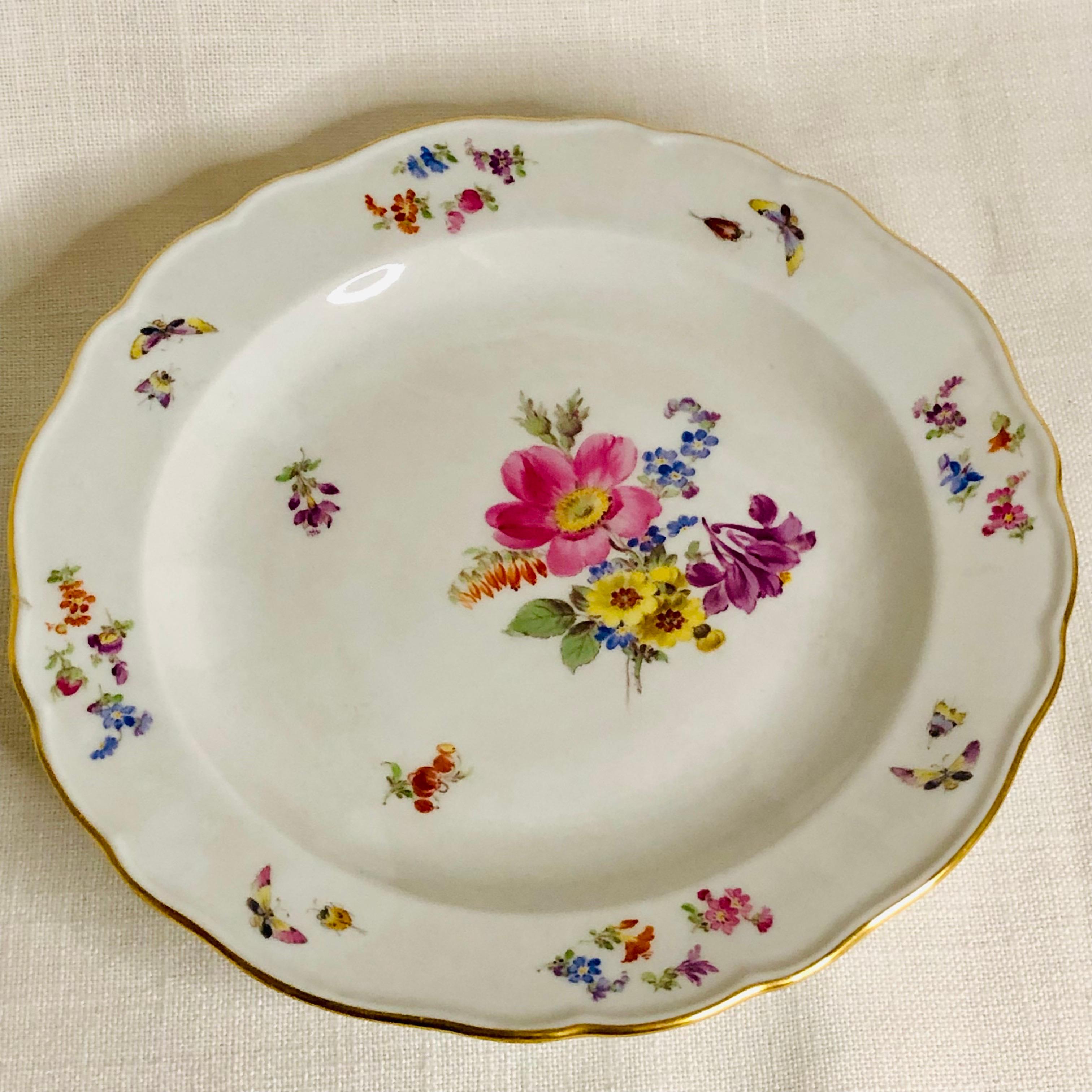 Early 20th Century Set of 12 Meissen Luncheon Plates Each Painted with a Different Flower Bouquet For Sale