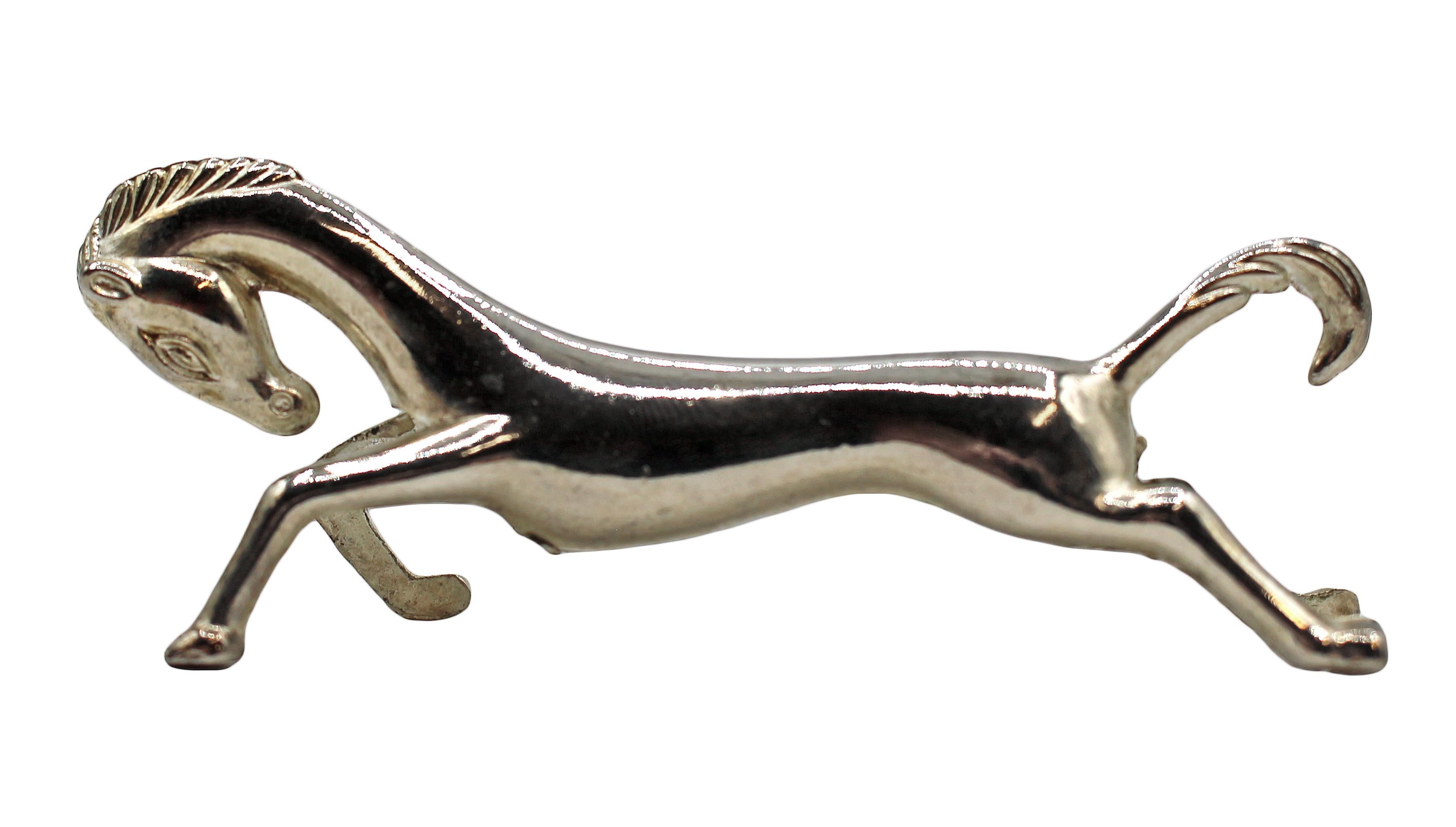 Mid-Century Modern set of 12 running horse knife rests, chrome plated, French. Wear commensurate with age & use.

Measures: 3 1/4