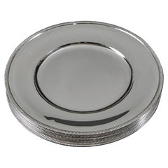 Set di 12 sottopiatti in argento di metà secolo