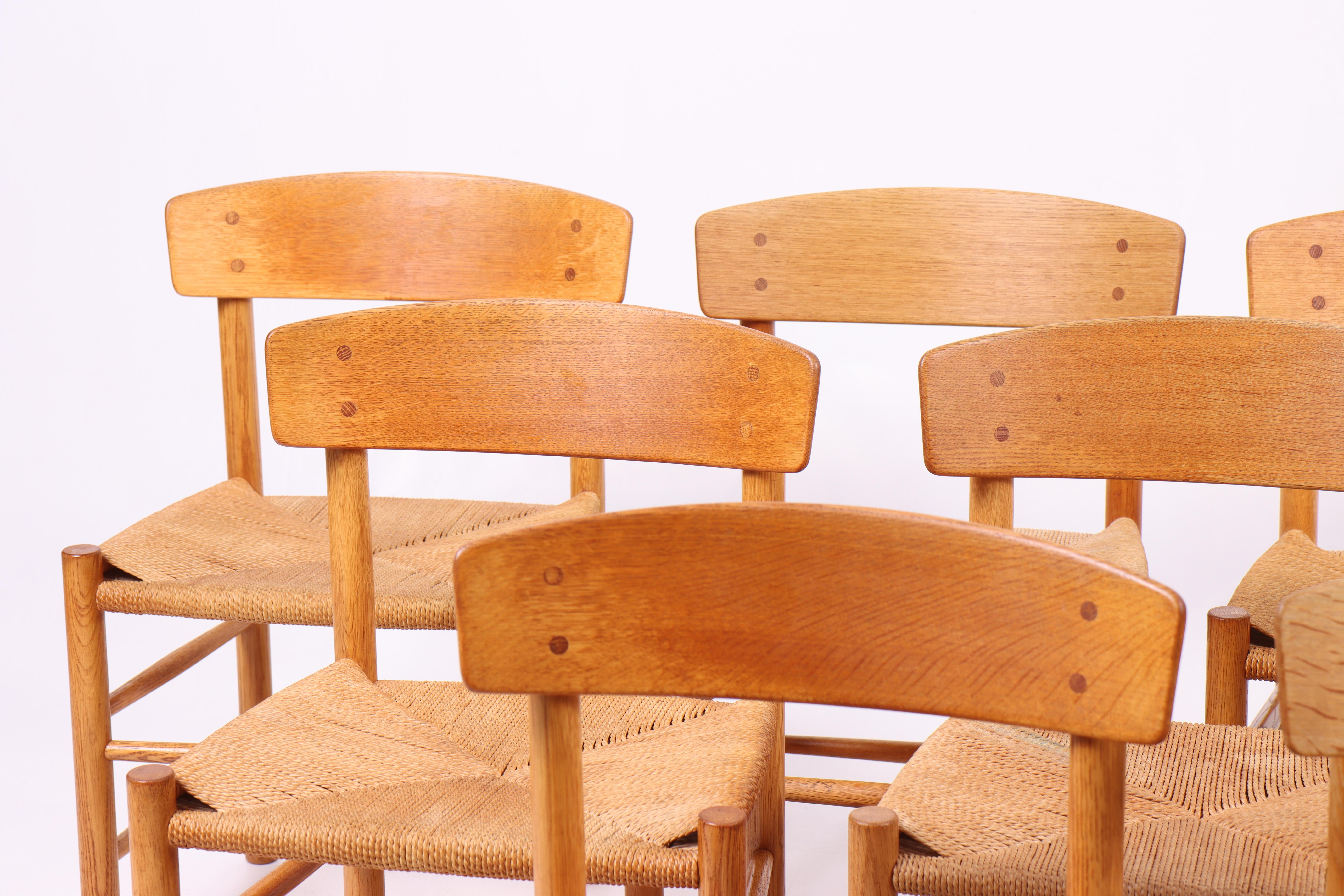 Danois Ensemble de 12 chaises d'appoint du milieu du siècle en Oak et Paper Corde par Børge Mogensen en vente