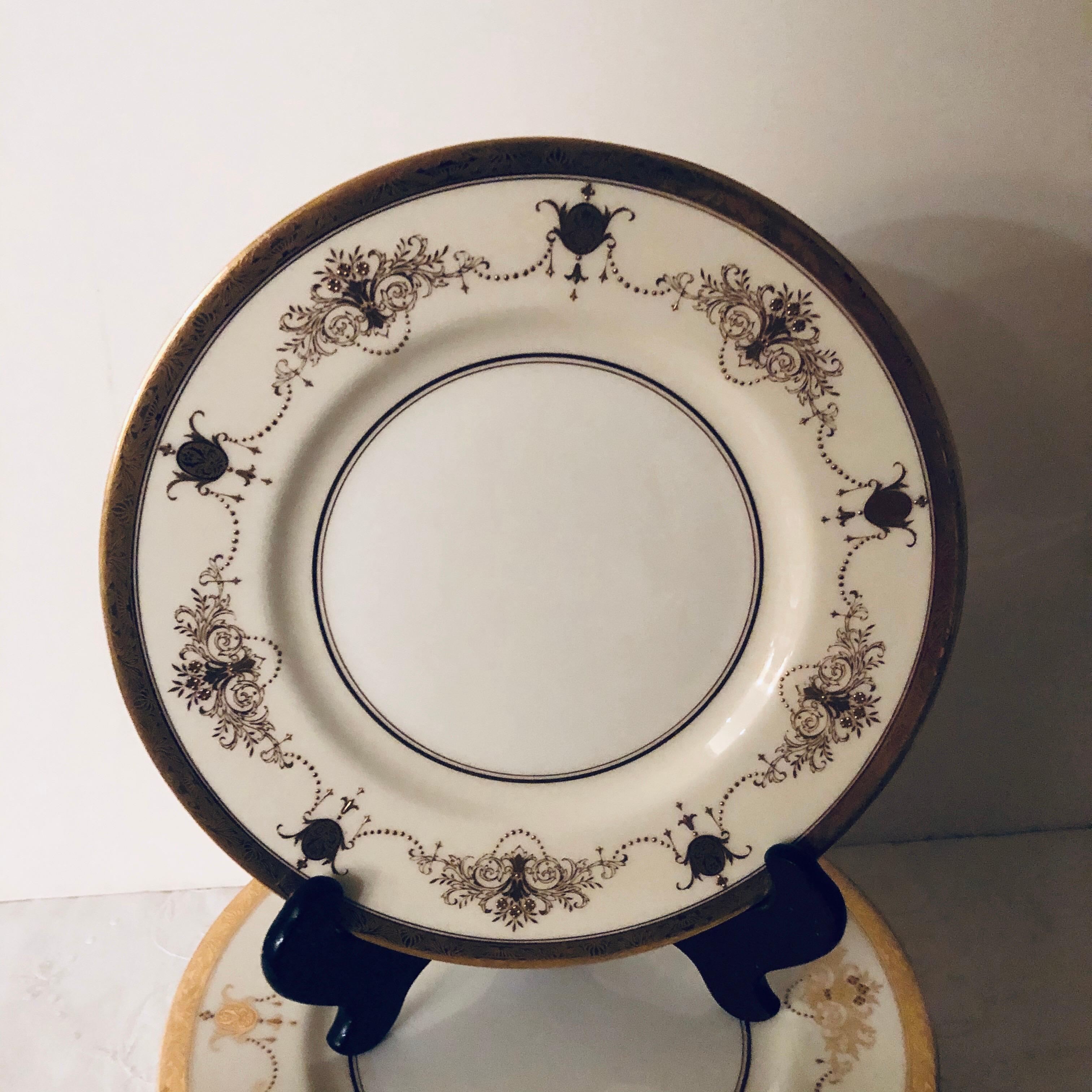 Early 20th Century Set of 12 Minton Dinner Plates Decorated with Ribbons of Raised Gilded Jeweling For Sale