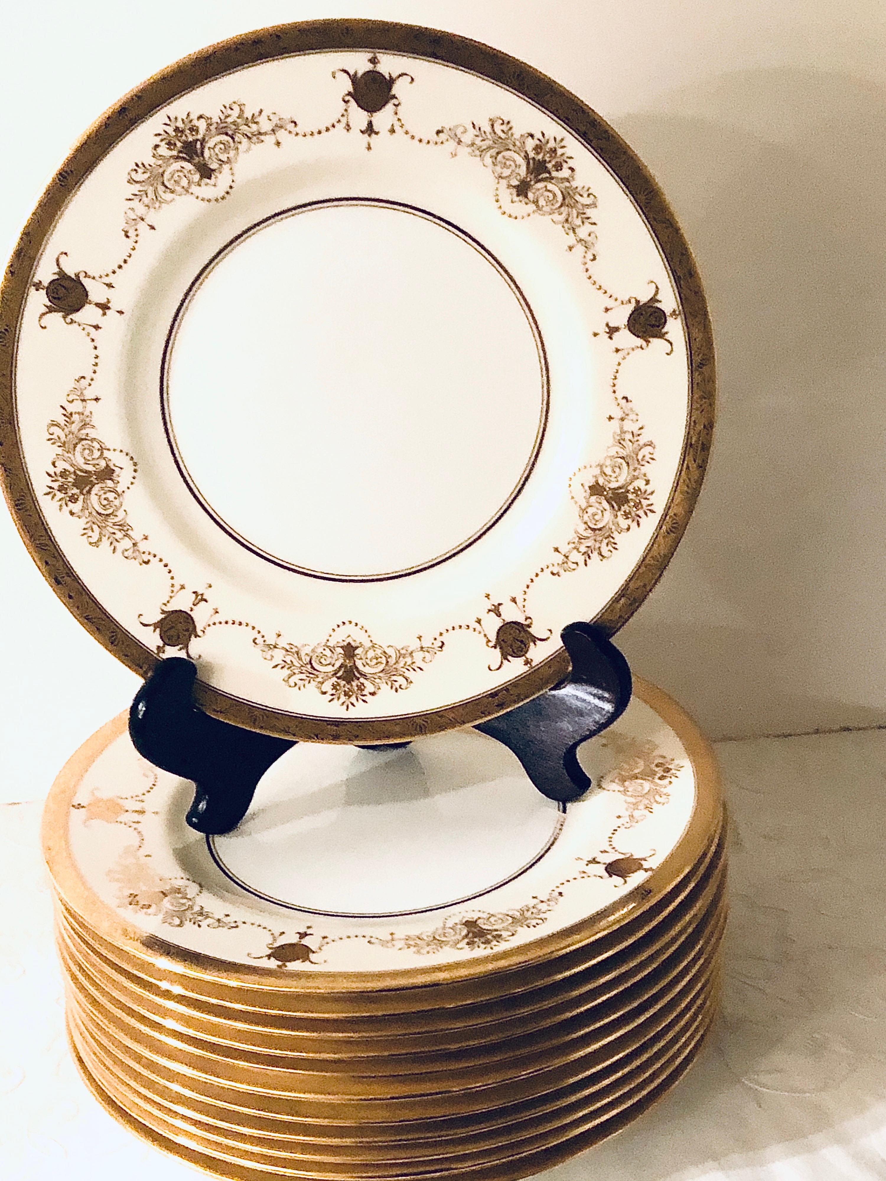 Gilt Set of 12 Minton Dinner Plates Decorated with Ribbons of Raised Gilded Jeweling For Sale