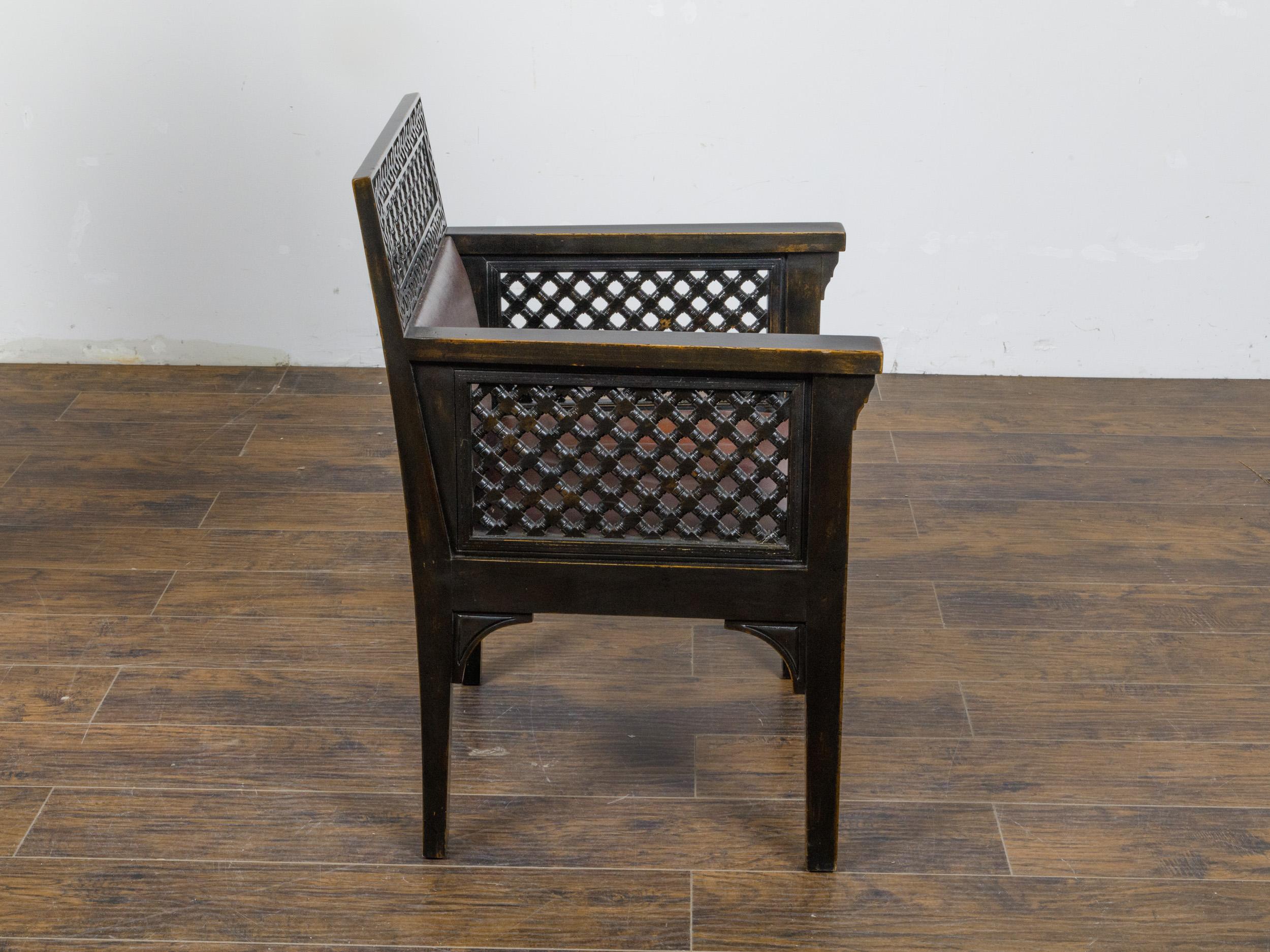 20th Century Set of 12 Moroccan Ebonized Carved Wood Armchairs with Leather Seats, circa 1900 For Sale