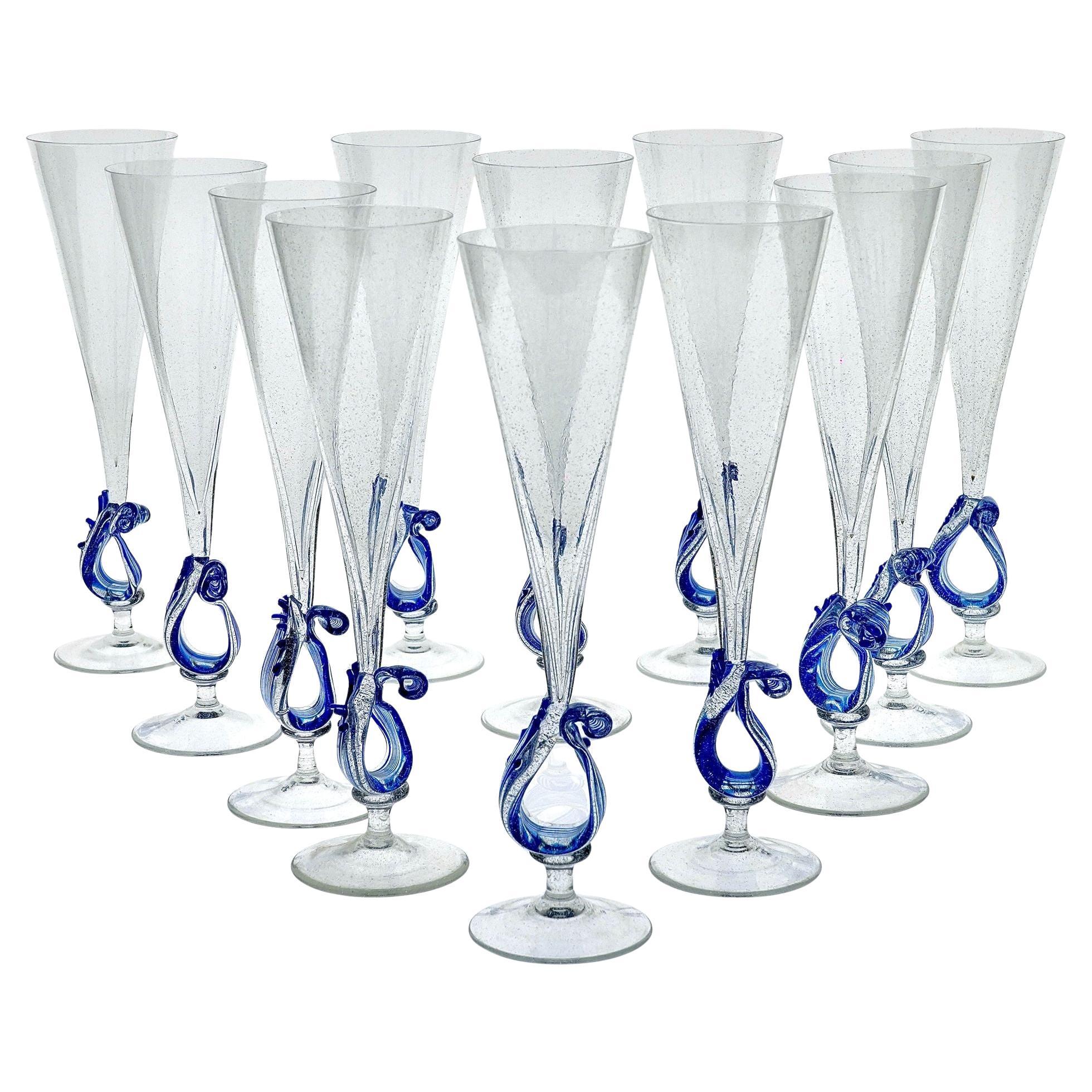 Set of 12 Murano Glass flutes with wave sculptural element by Cenedese For Sale