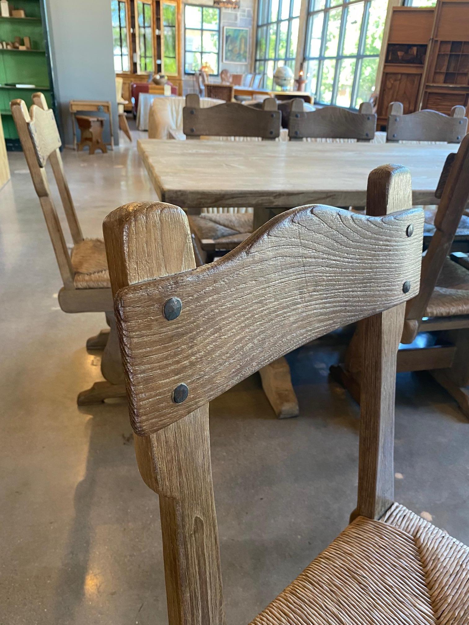 Set of 12 Oak and Rush Dining Chairs, France, 1950's In Good Condition In Austin, TX