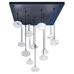Set Of 12 Oval Pendant Lamps by United Alabaster