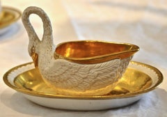 Set of 12 Period Empire Bisque Porcelain and Gilt Swan Cups, Marked Sevres