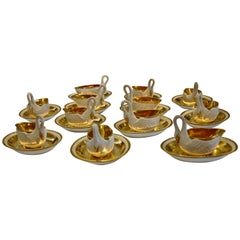 Set of 12 Period Empire Bisque Porcelain and Gilt Swan Cups, Marked Sevres