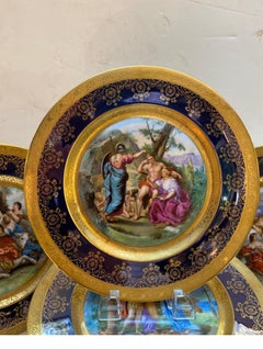 Set of 12 Porcelain Allegorical Scene Plates
