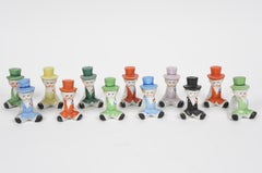 Set de 12 Servilleteros de Porcelana Figurados Caballero atildado