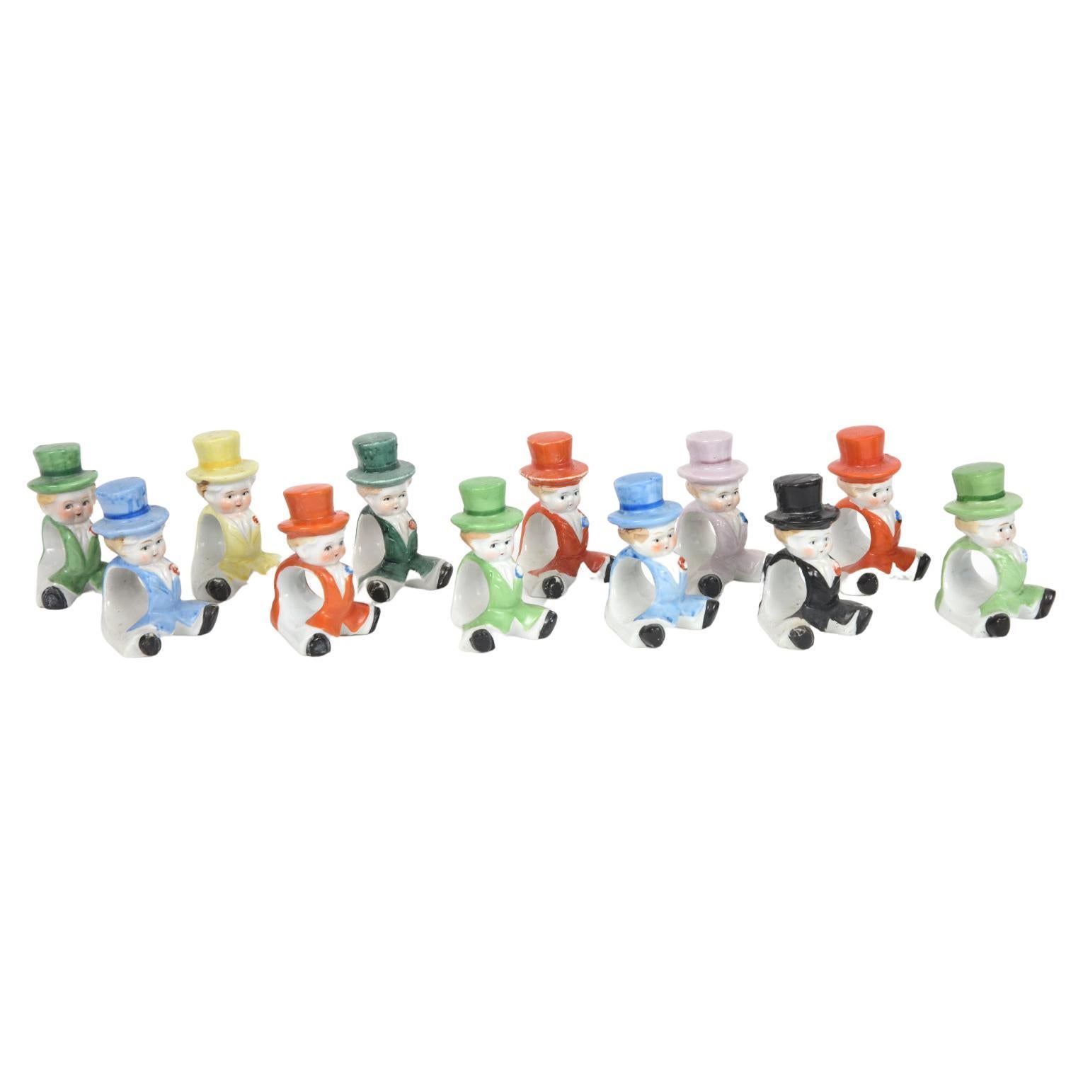 Satz von 12 Porzellanfiguren Dapper Gentleman Serviettenringe im Angebot