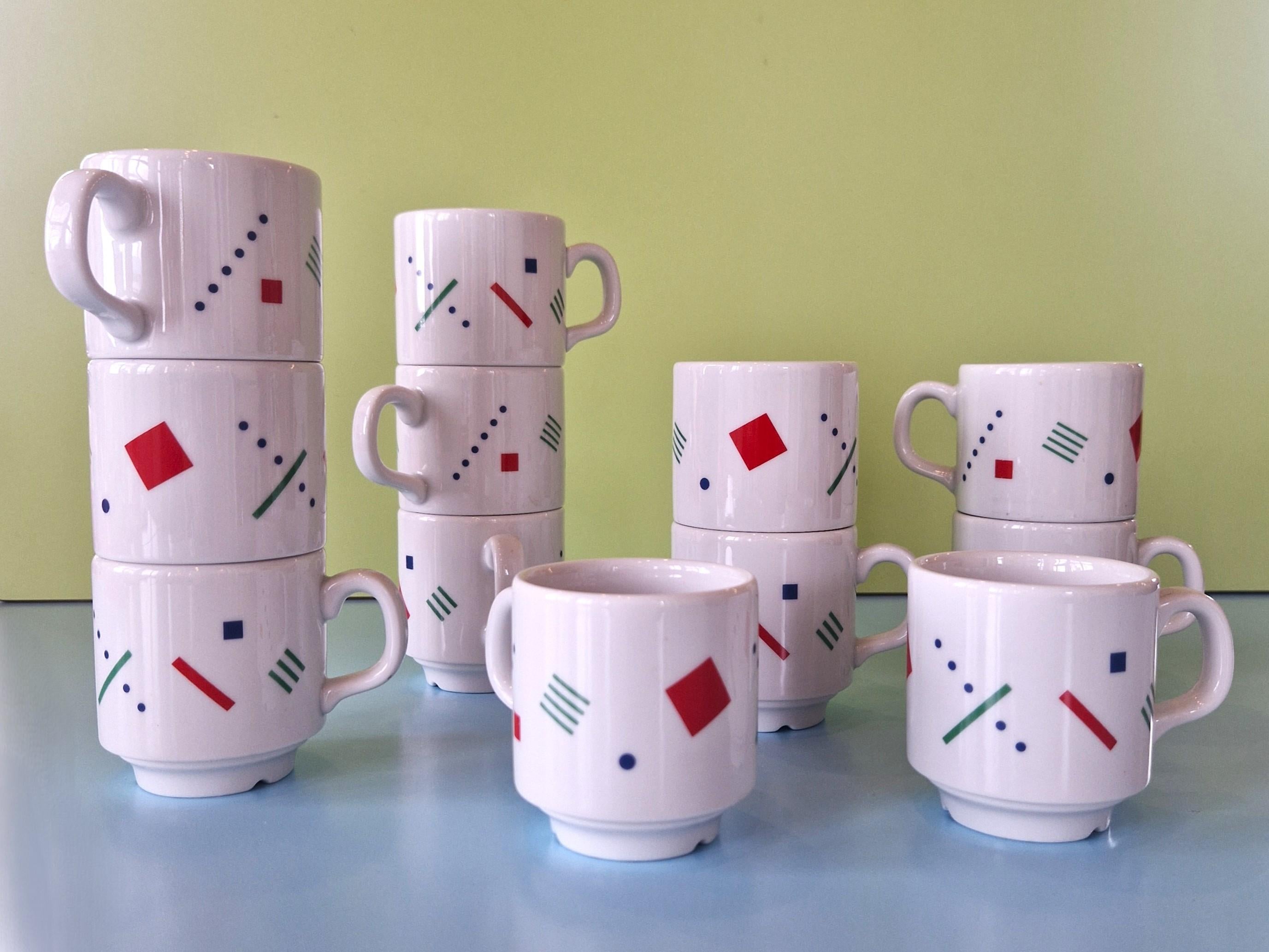 This set of 12 Postmodern porcelain coffee cups were made by Royal Mosa Maastricht in the 1980's in The Netherlands. Made with a true eighties print with its fresh colors and pattern. This set is in a very good condition.

Parcel shipping with UPS