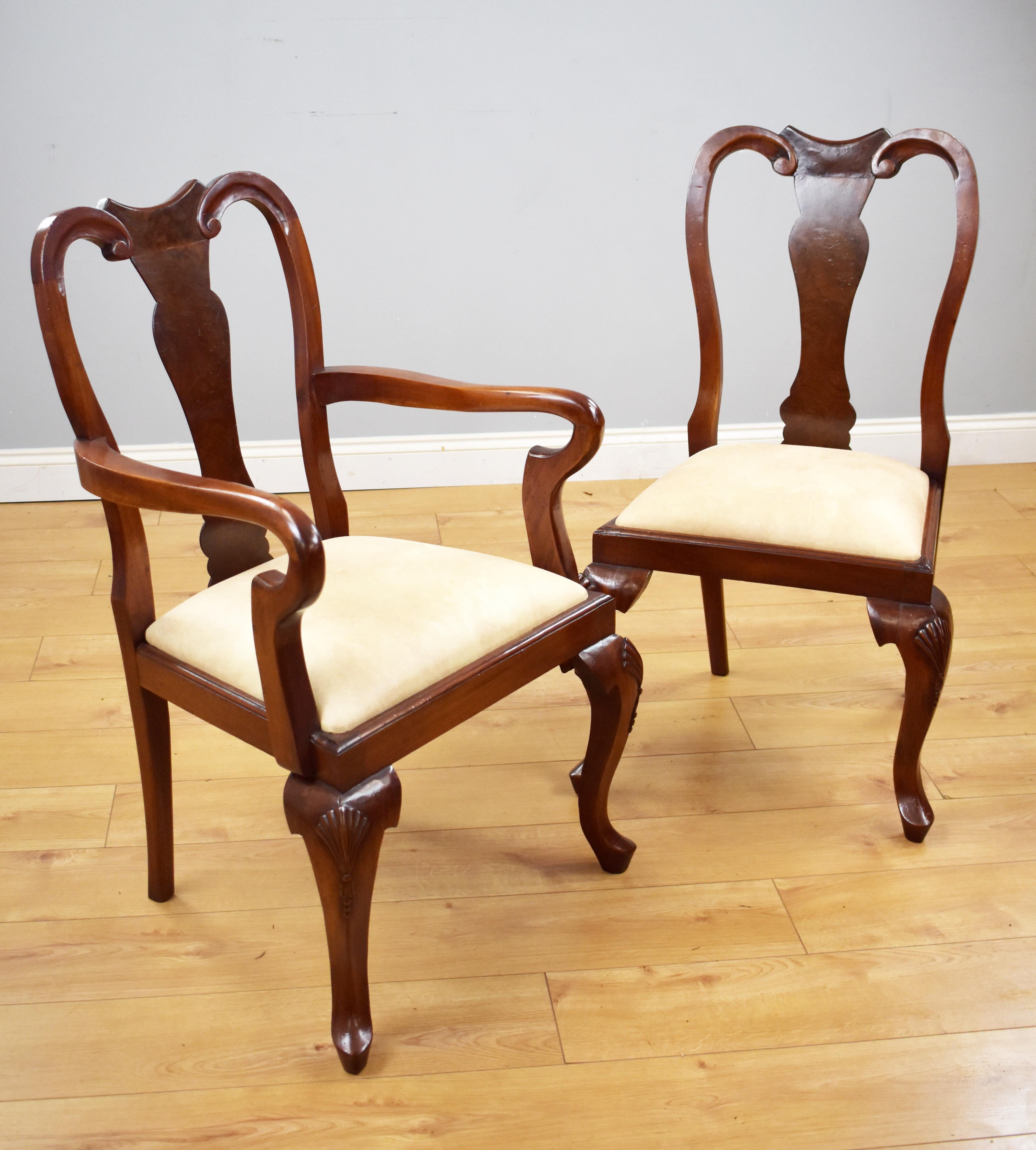 For sale is a good quality set of 12 Queen Anne style burr walnut dining chairs, each with vase shaped backs above drop in seats standing on cabriole legs. Each chair is structurally sound and in good condition having been recently re-upholstered