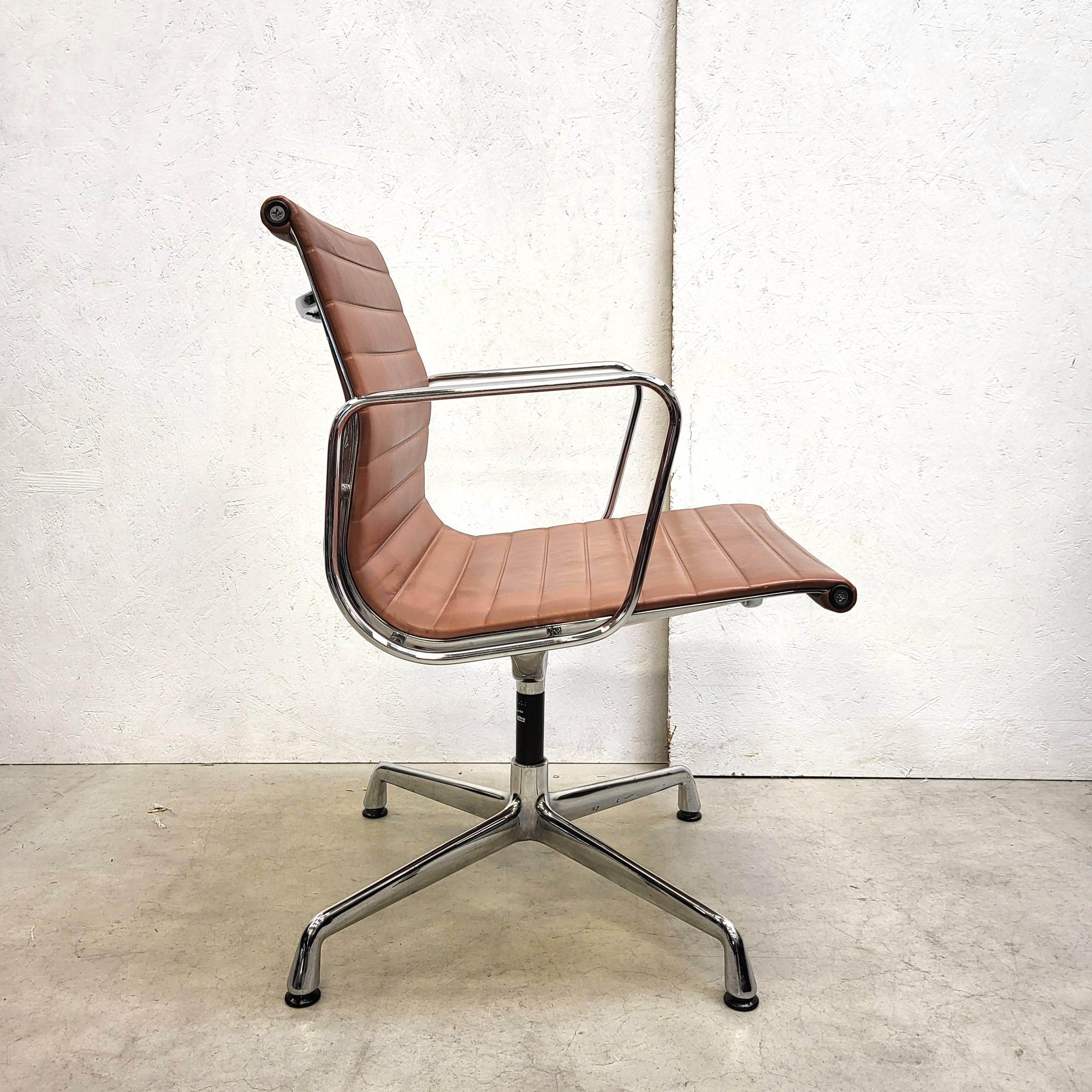 American Set of 12 Rare Cognac Vitra EA107 Aluminium Chairs by Charles Eames
