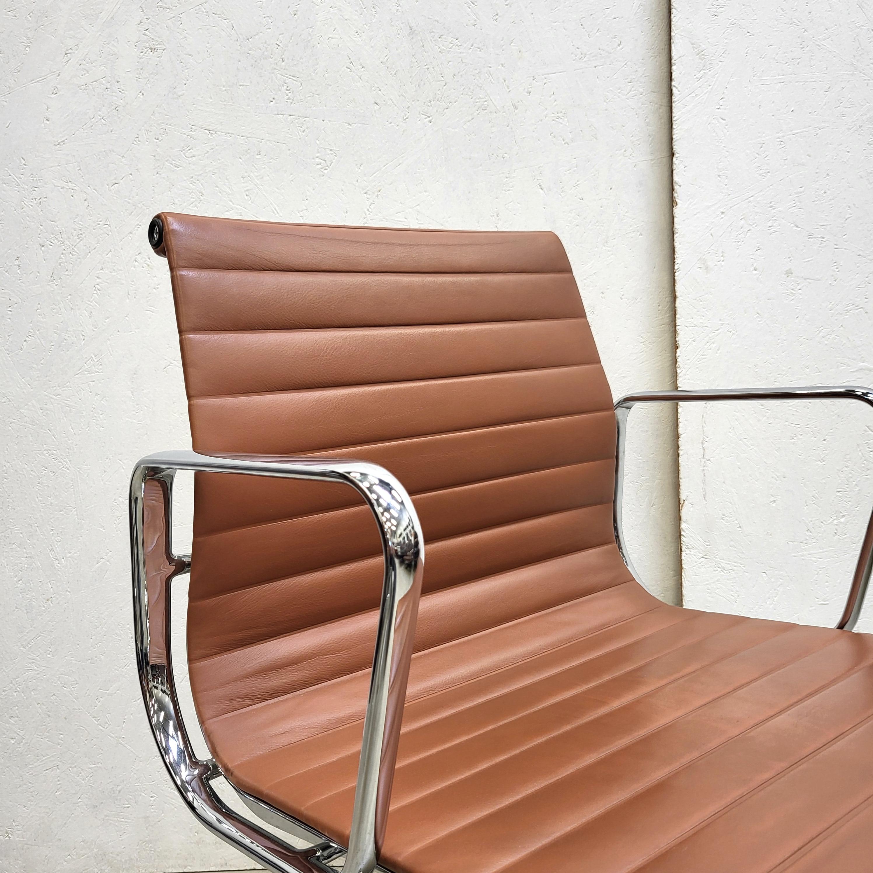 Set of 12 Rare Cognac Vitra EA107 Aluminium Chairs by Charles Eames In Good Condition In Aachen, NW