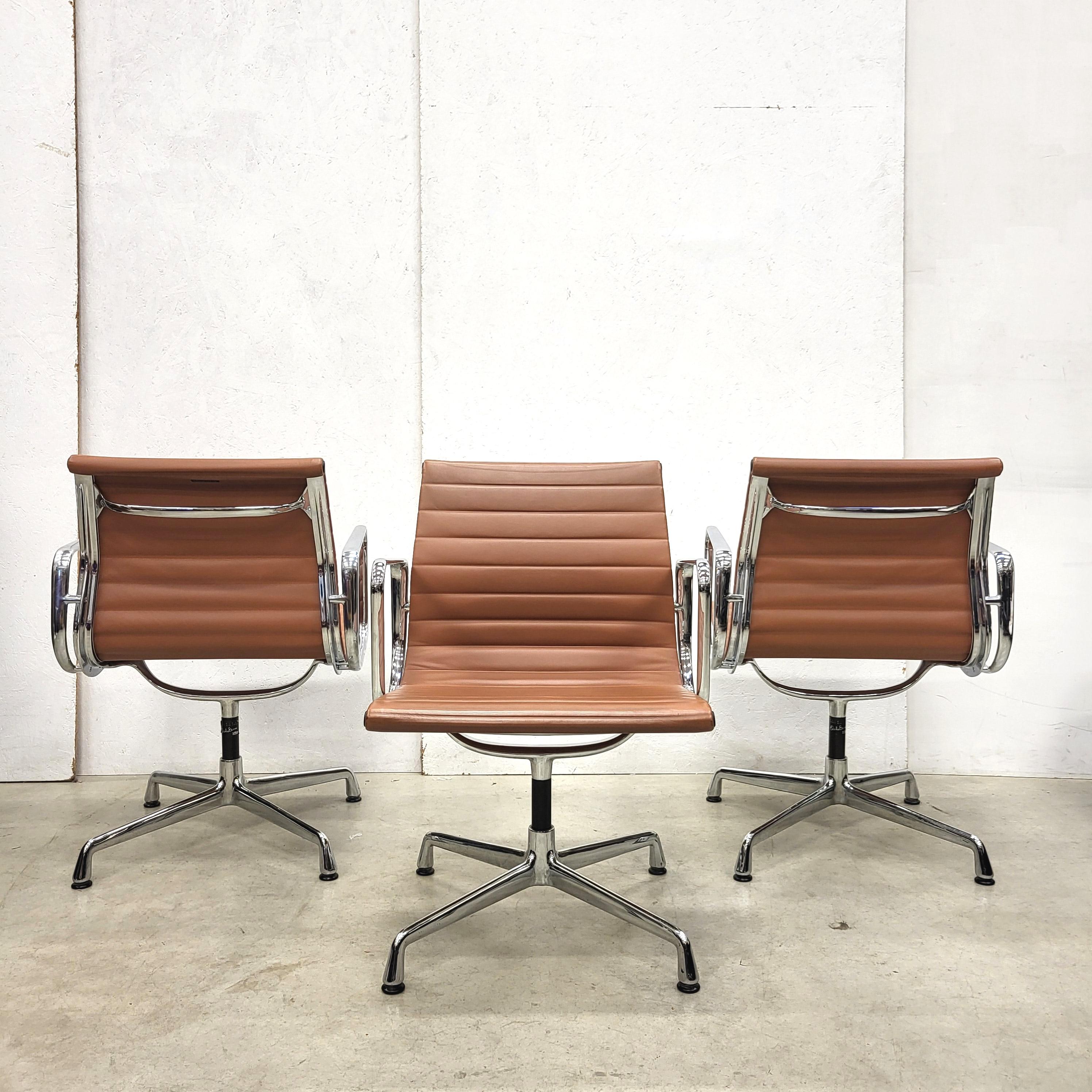 Late 20th Century Set of 12 Rare Cognac Vitra EA107 Aluminium Chairs by Charles Eames