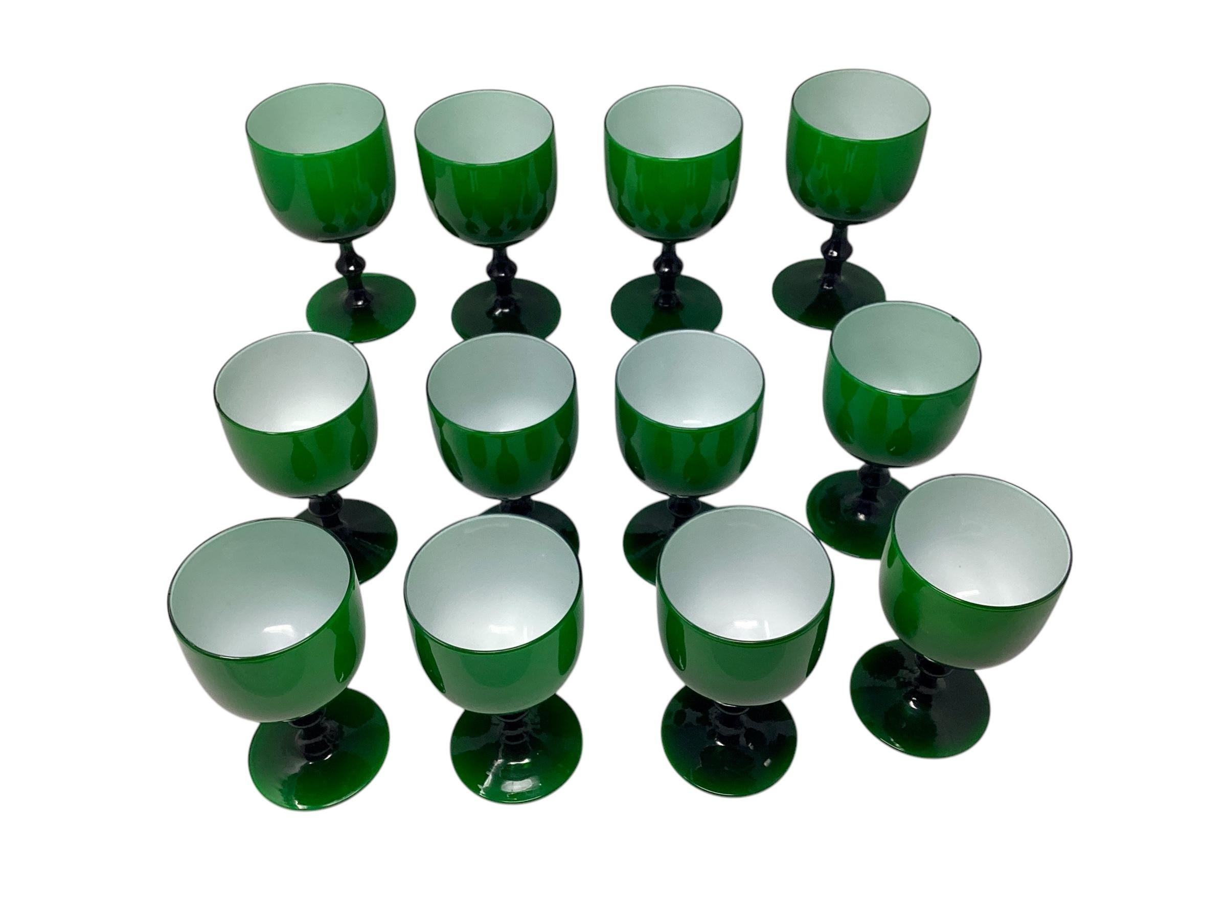 Set of 12 Rare Murano Wine or Water Goblets attributed to Carlos Moretti. In good vintage condition . One glass has a tiny flake on the rim as shown in images.