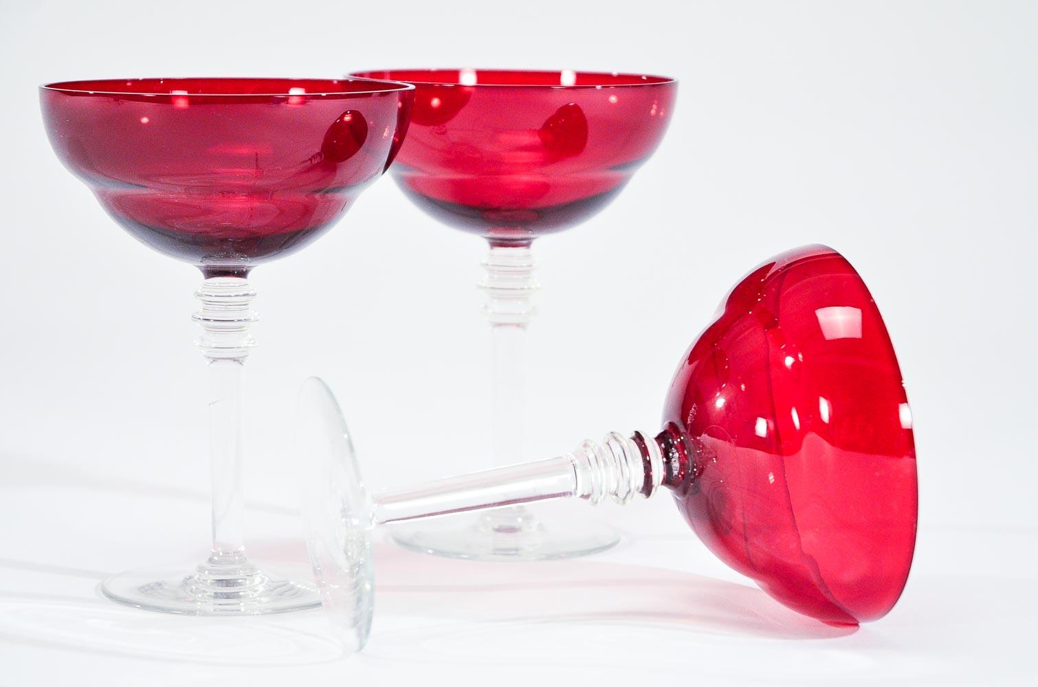 Glass Set of 12 Art Deco Style Ruby Red Crystal Champagne Coupes and Martini Goblets For Sale