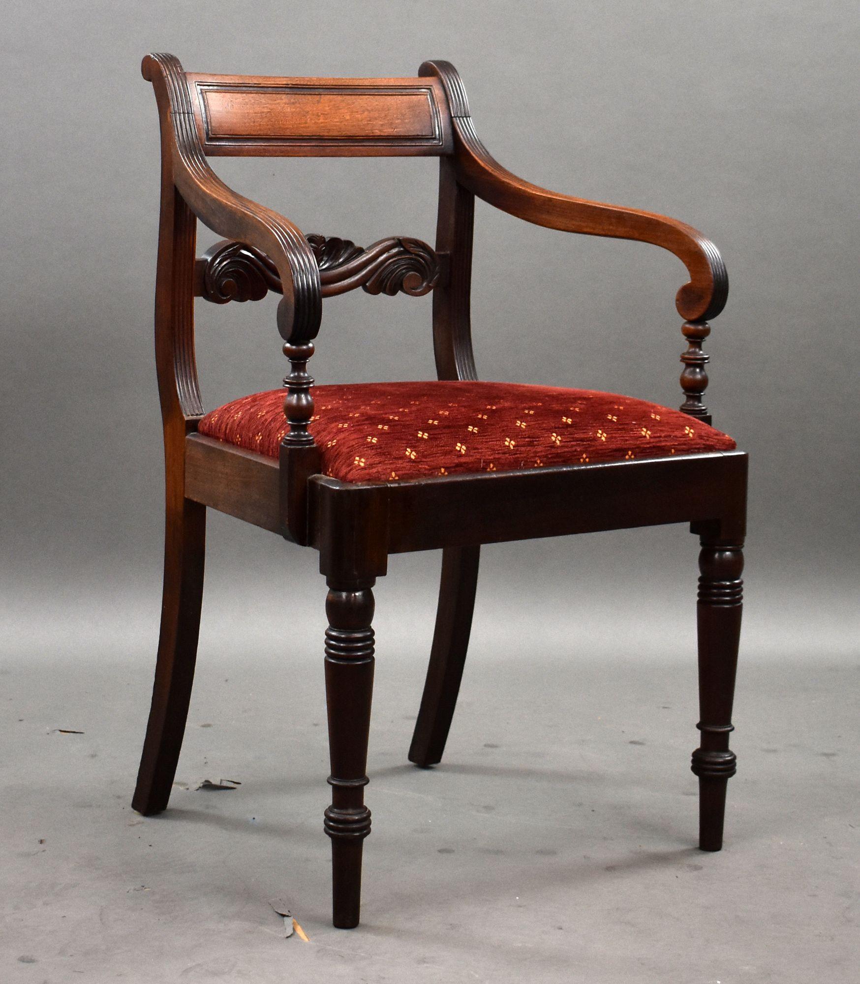 Set of Twelve Regency Mahogany Dining Chairs Including Two Carvers
Item Code: 1361
A superb set of twelve Regency period mahogany dining chairs, comprising ten single chairs and two carvers. Crafted with elegance and durability, each chair features