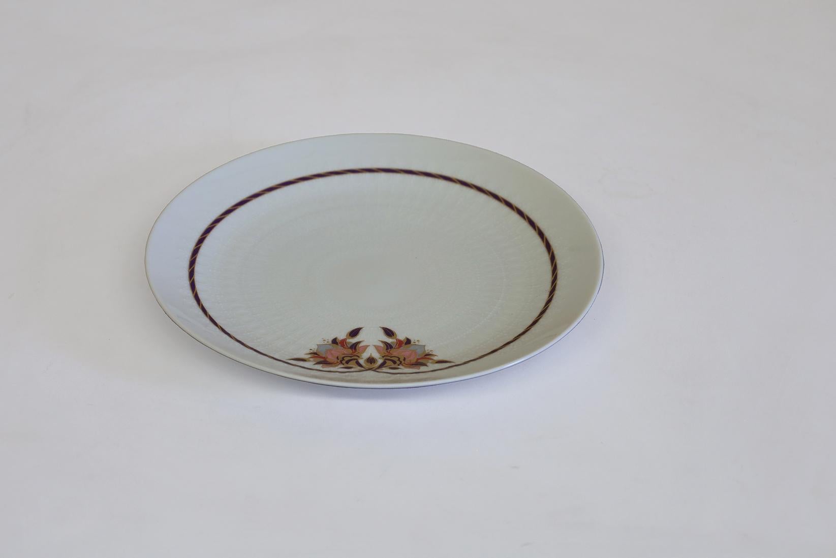 This is a set of 12 porcelain Salad Plates by Rosenthal.
Never used. 
Very nice texture and color combination.