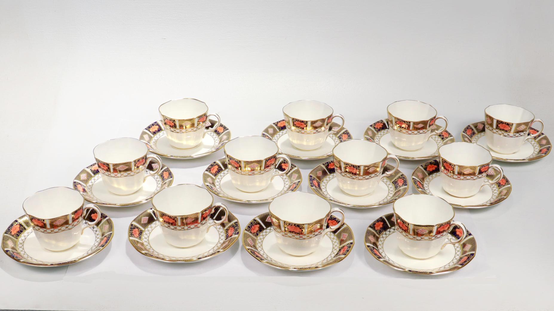 Gilt Set of 12 Royal Crown Derby Porcelain Border Imari Pattern 8450 Cups & Saucers For Sale