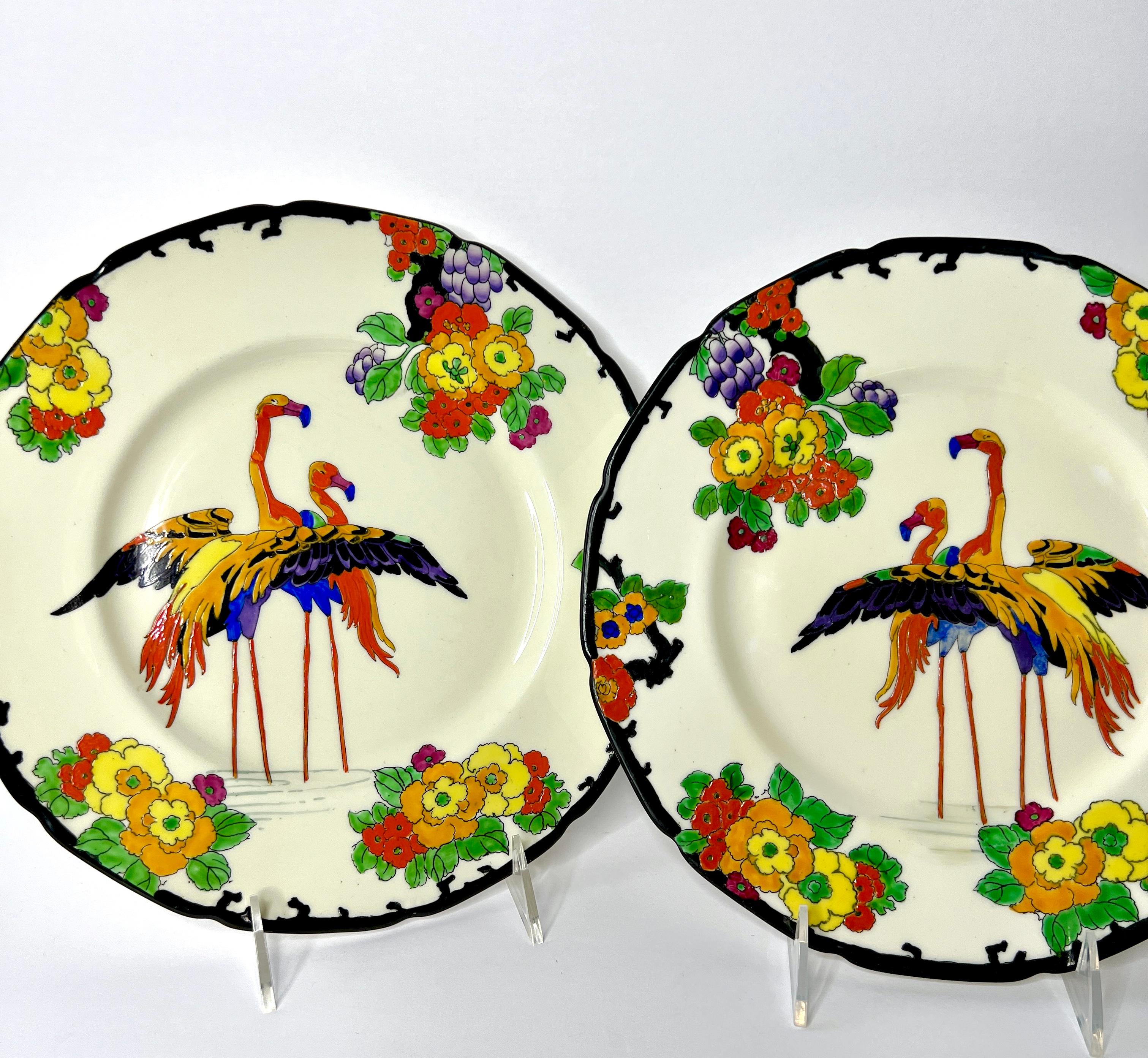 Designed by the iconic Robert Allen, head of the decorating department at Royal Doulton, this is a rare pattern and a full set of 12 Flamingo dinner plates. What sets them apart is that 4 of the plates have the flamingos facing each other which is