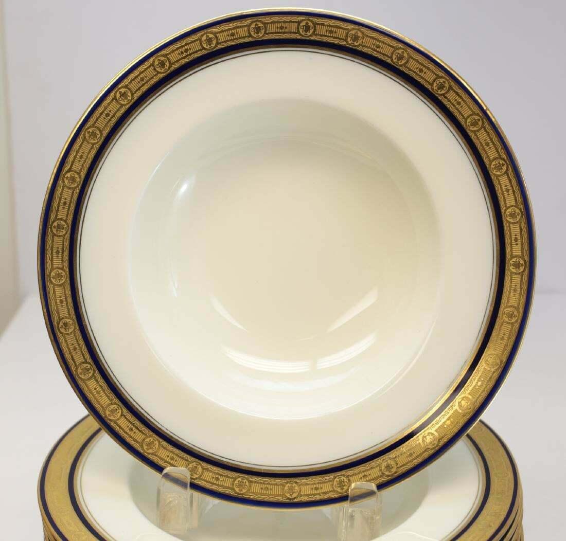 Set of 12 Royal Worcester porcelain soup bowls, cobalt blue and gilt rims

Cobalt blue & gilded rims on ivory background.

Additional Information:
Type: soup bowl 
Color: Blue
Brand: Royal Worcester
Dimension: 8.75 inches