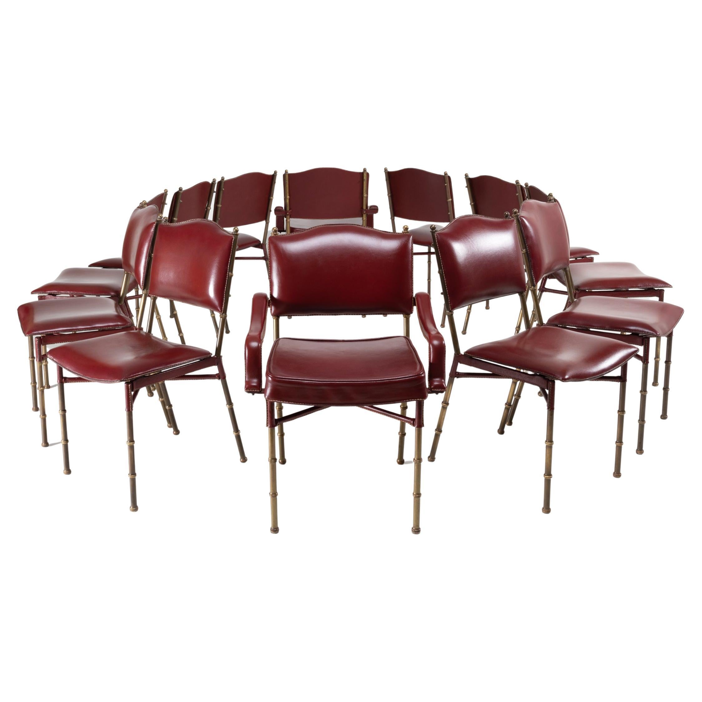Set of 12 Saddle Stitched Red Leather Chairs by Jacques Adnet, France
