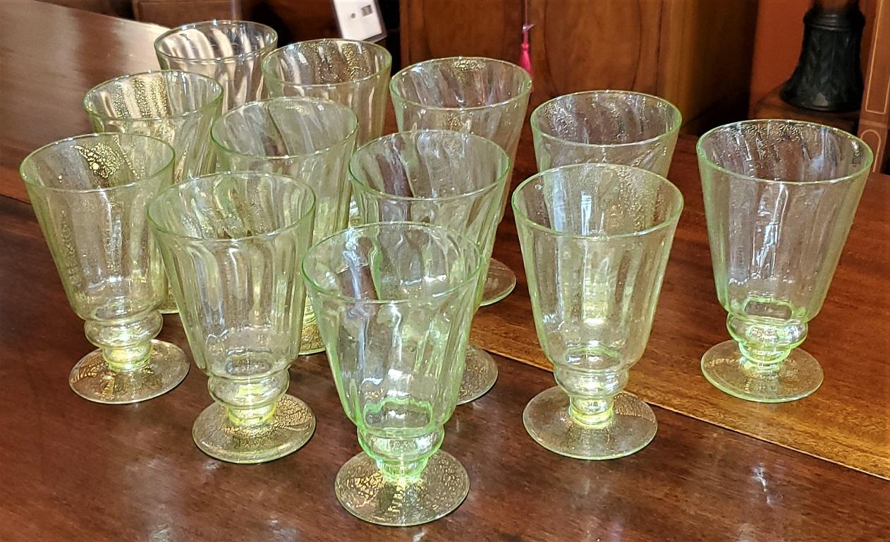 presenting a gorgeous Set of 12 Salviati Venetian green and gold flecked beer or water glasses.

Made in Venice, Italy circa 1940-50 by the World famous Salviati Glassworks.

In near mint condition with no chips or cracks.

Each consists of a