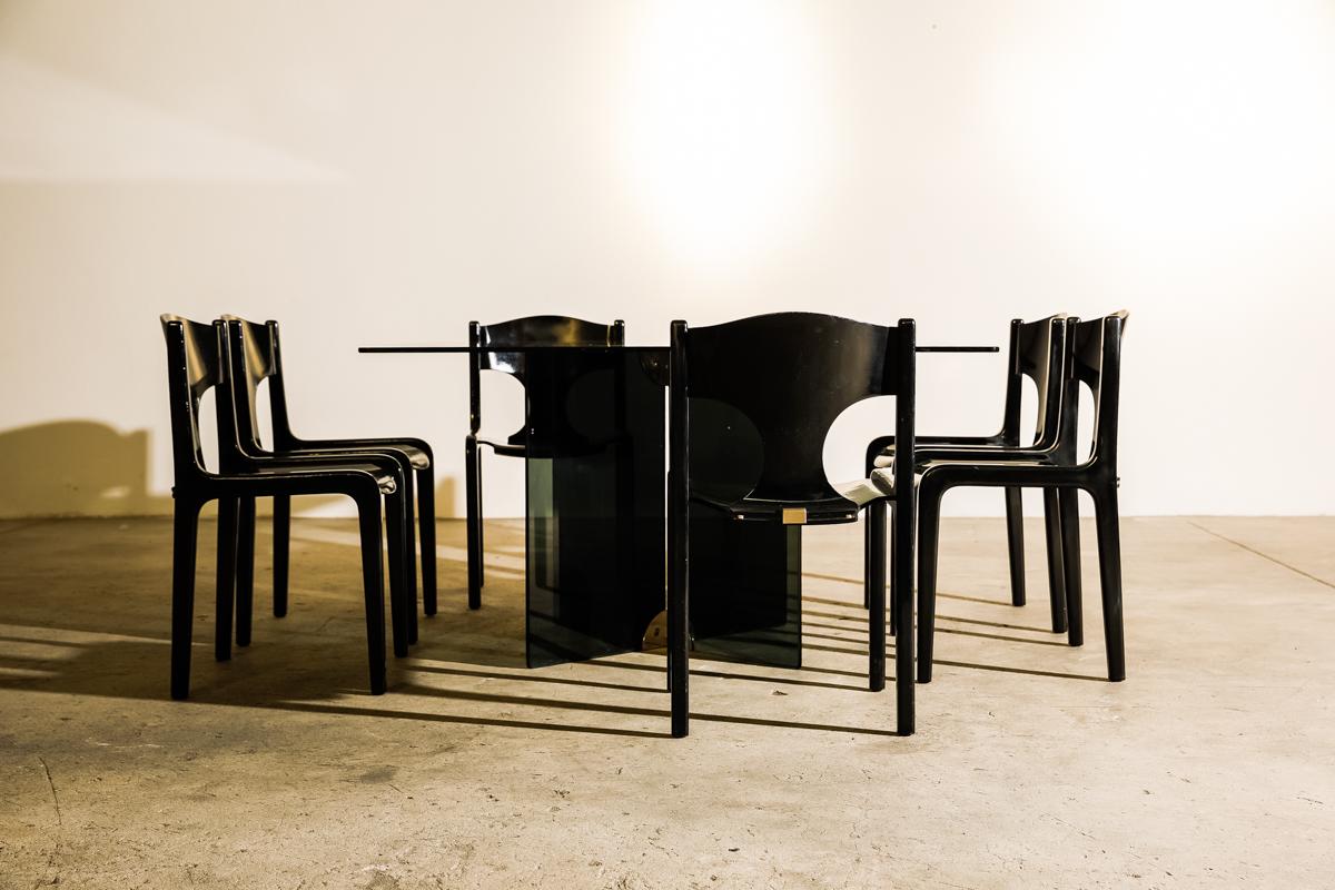 Rare set of 12 chairs which were first presented at Galleries LaFayette by Pozzi in 1968. Like all work from Savini they are characterized by their refined simplicity.