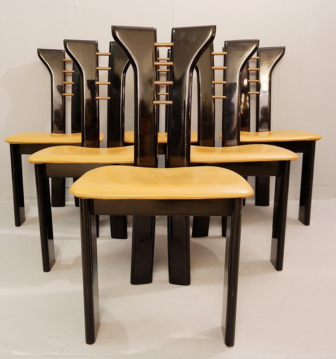 Set of 6 sculptural 1970s black lacquer Pierre Cardin chairs with leather seats.