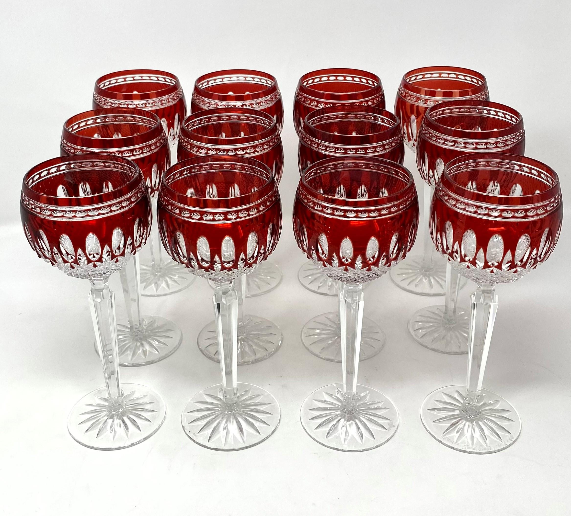 Set of 12 signed Waterford crystal clarendon ruby wine glasses.