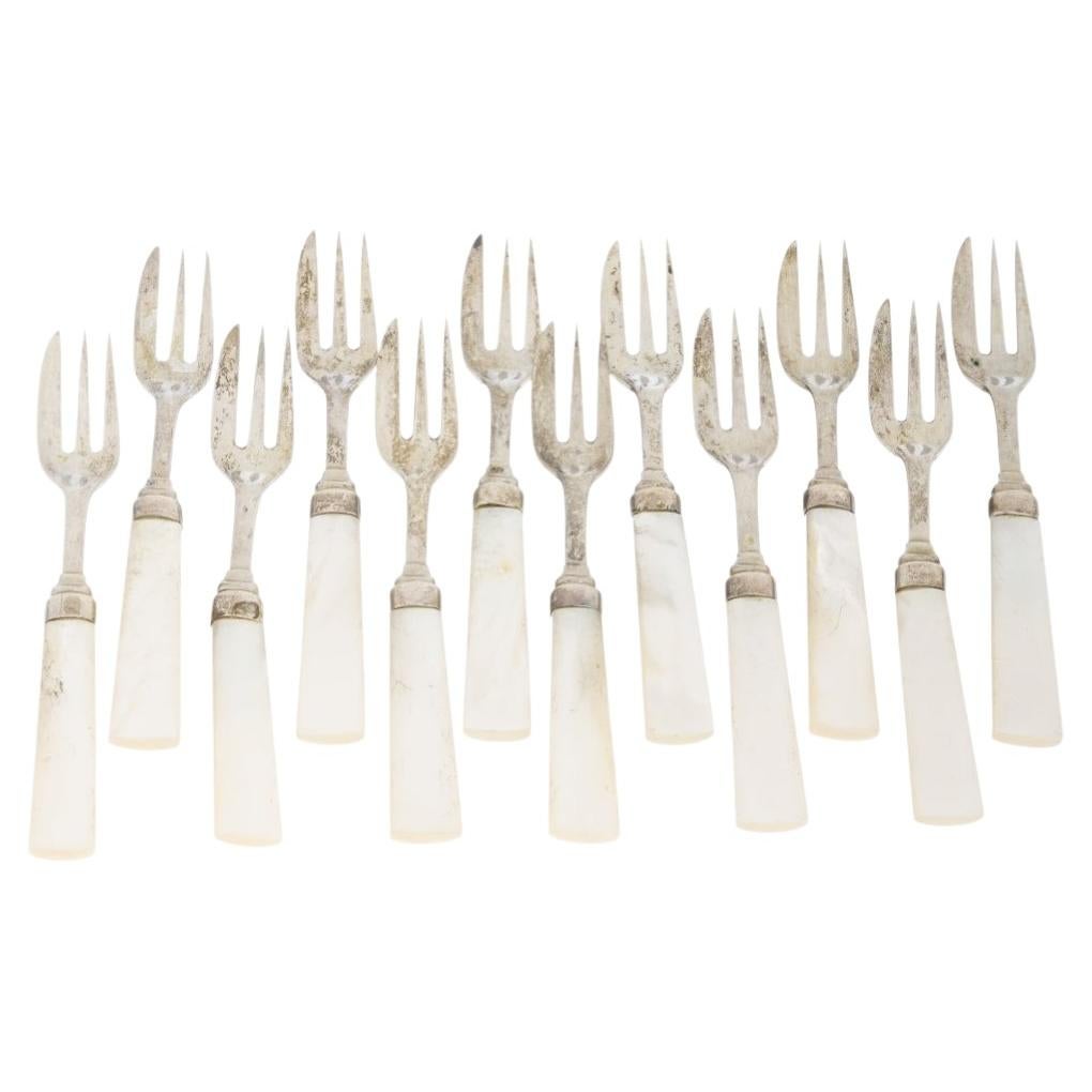 Set of 12 Silver Forks - Jose Rosas