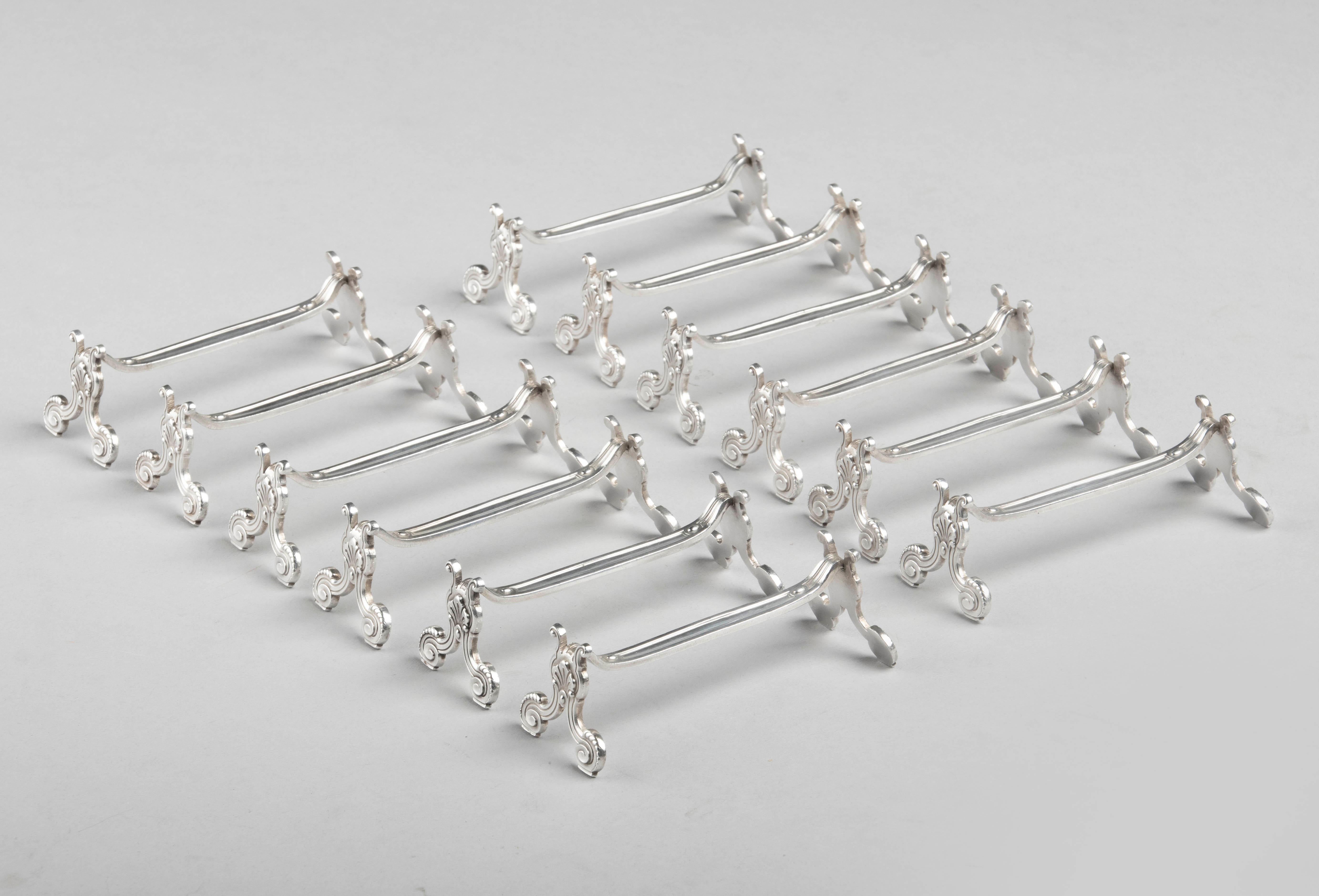 Nice set of 12 silver plated knife shelves from the French brand Christofle. The name of this model is Marie - Antoinette, sometimes also called Vendome. The knife rests are in very good condition.