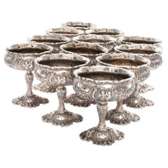 Set of 12 Sterling Sherbets with a Design of Putti's and Garlands