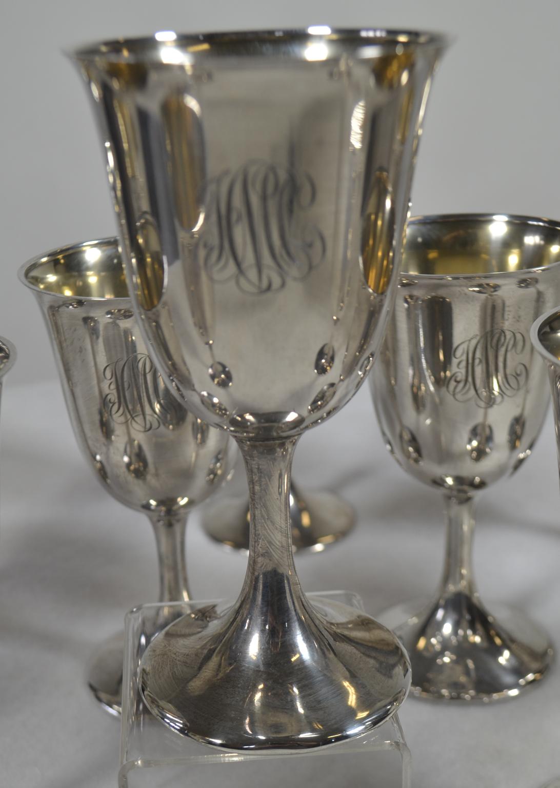 Set of 12 sterling silver goblets, early 20th century by Frank W. Smith, # G59, with gilt washed interiors, monogramed 