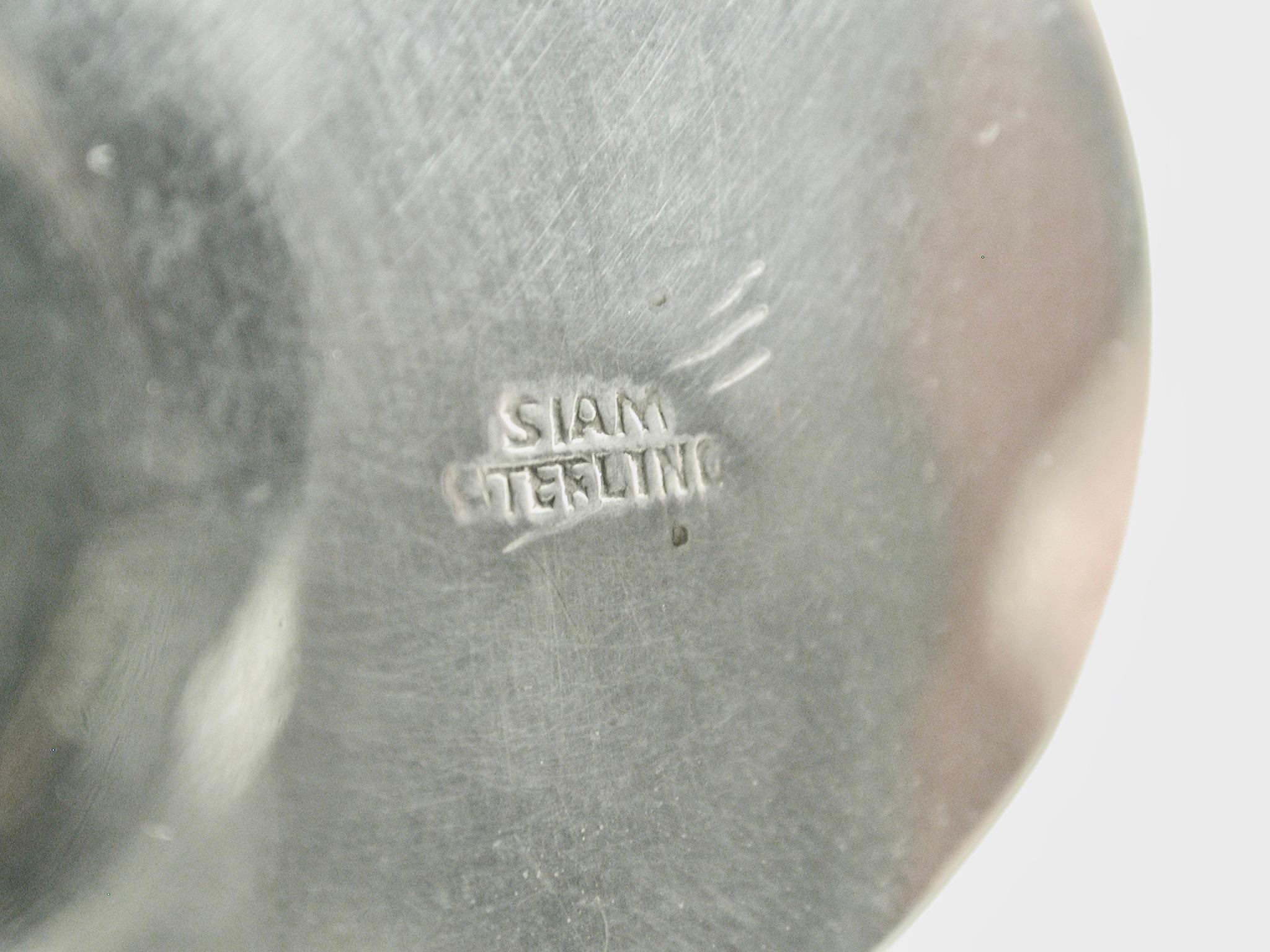 Juego de 12 Mantenedores Siameses Triple Elefante de Plata de Ley  C.1930 Plata esterlina en venta