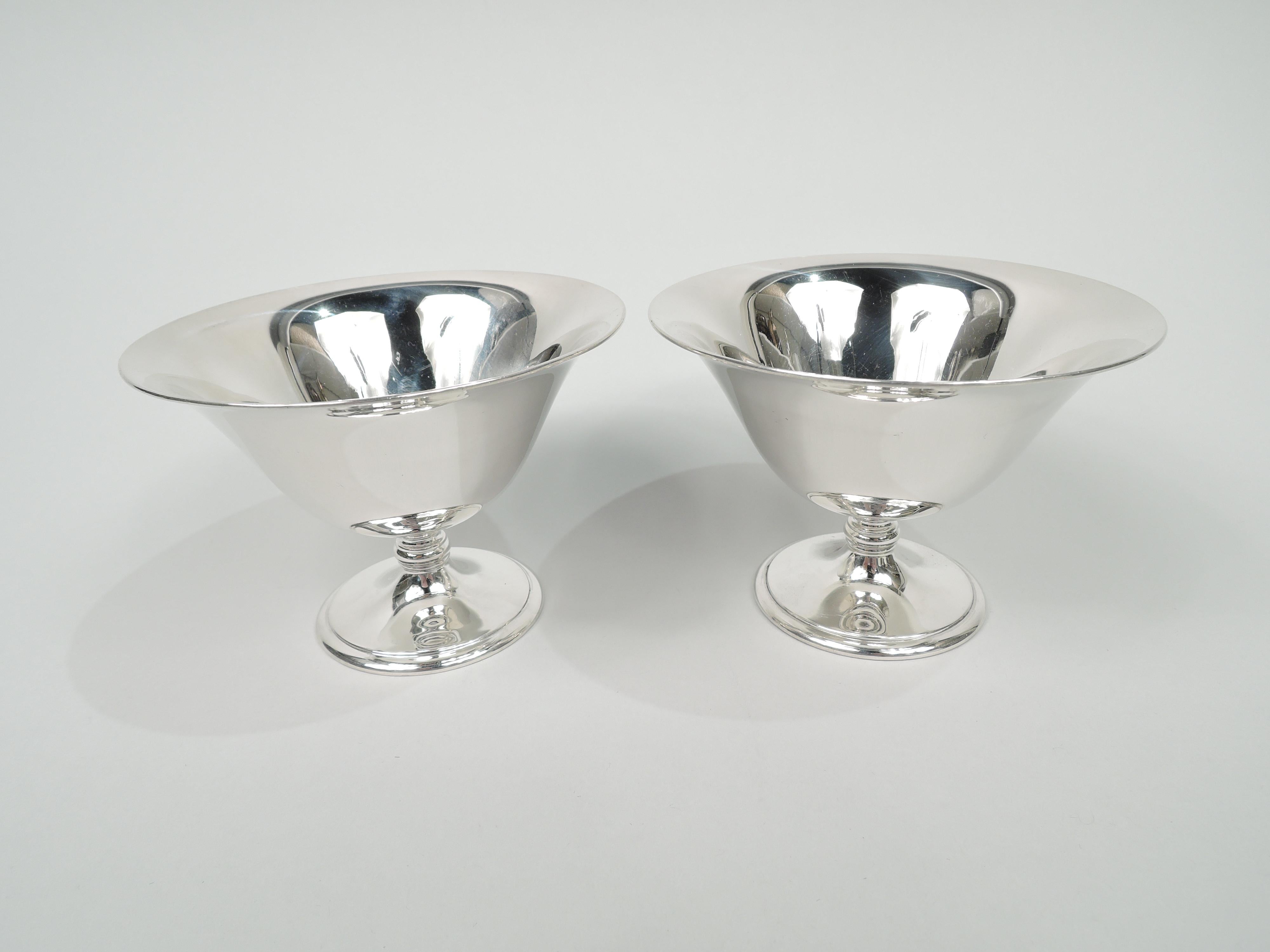 Twelve Modern sterling silver dessert cups. Made by Tiffany & Co. in New York, ca 1926. Each: Round bowl with flared rim and curved and tapering sides; knopped stem and raised and stepped foot. A great set for serving your favorite gelato. Fully