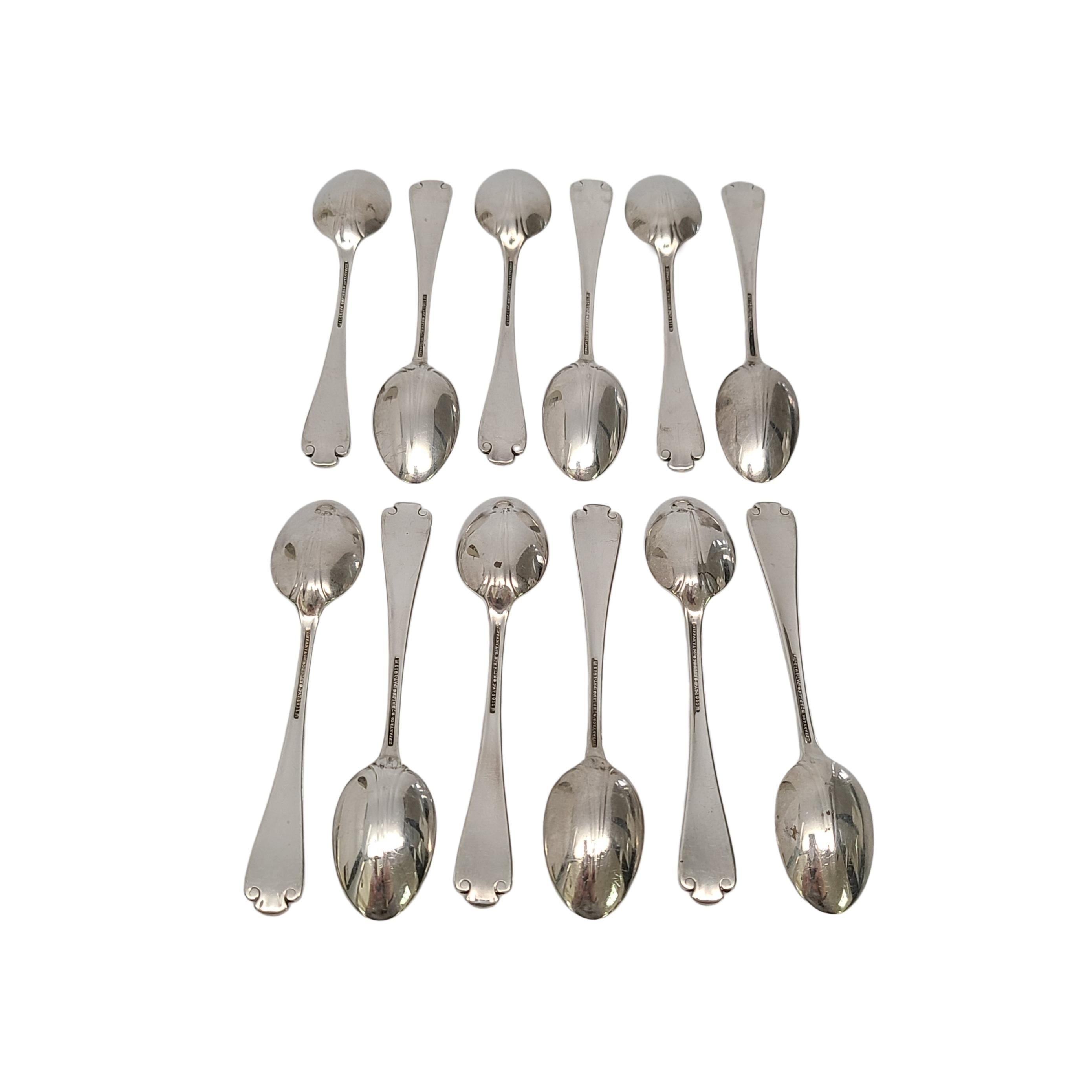Set of 12 sterling silver demitasse spoons by Tiffany & Co in the Flemish pattern.

Monogram appears to be EWM

Beautiful small spoons in the Flemish pattern, featuring a simple and elegant scroll design, making it a timeless classic that is still