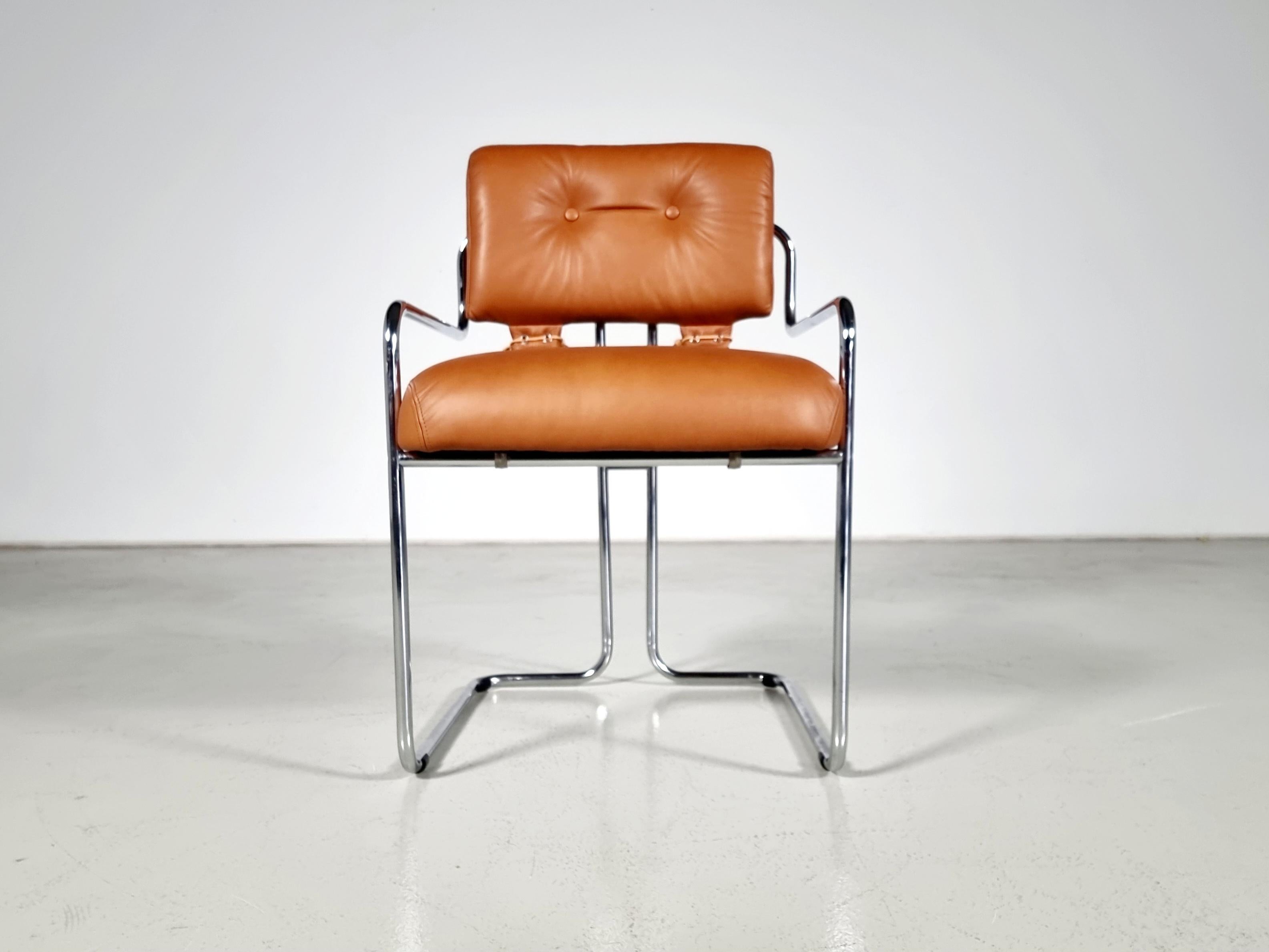 Tucroma dining chairs, Guido Faleschini, Mariani, 1970s

Set of 12 cognac leather and chrome chairs designed by Guido Faleschini for Mariani, Pace collection. The leather upholstery is attached to graceful polished steel tubular frames, as well as