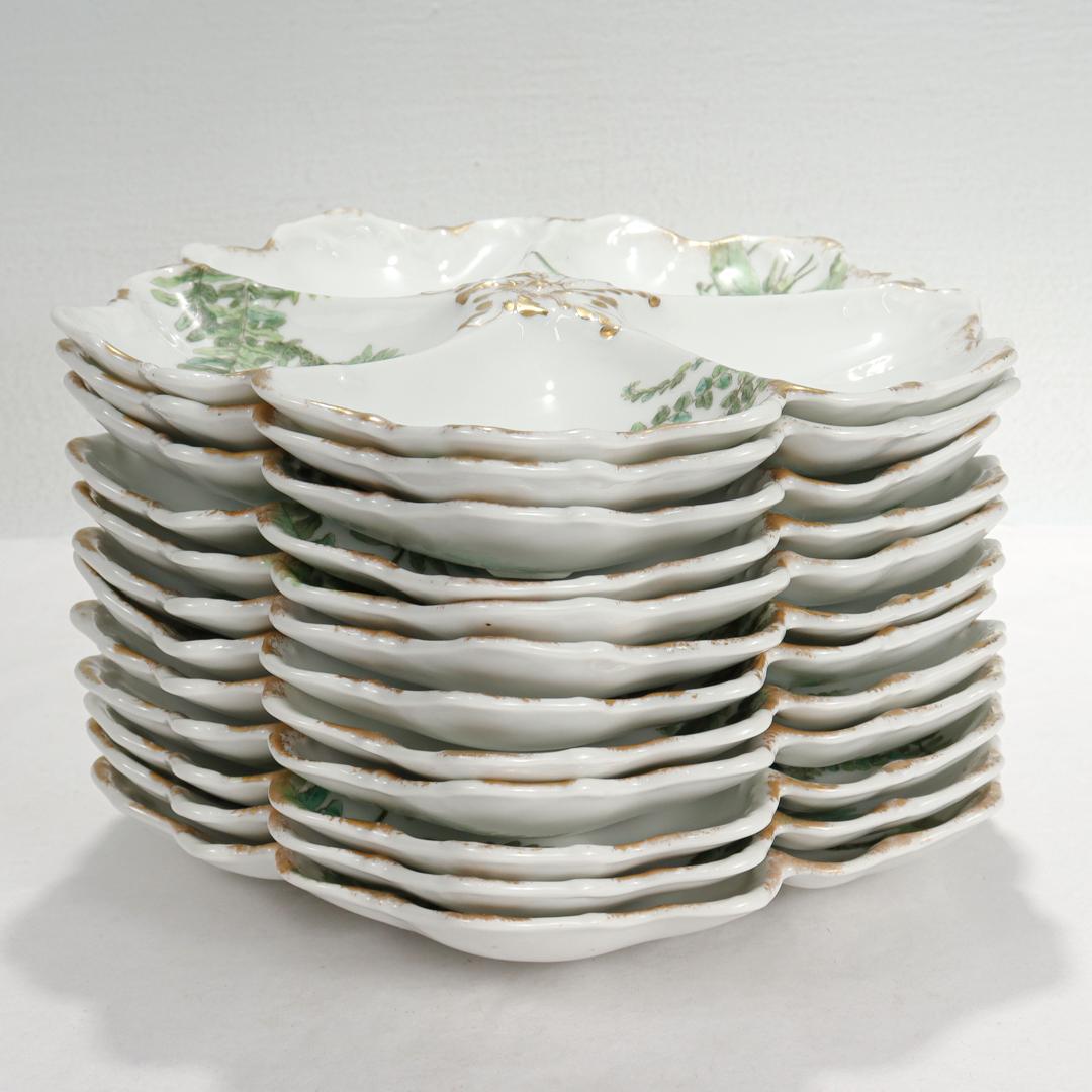 Edwardian Set of 12 T&v Limoges Gilt Porcelain Oyster Plates with Green Transfer Ferns For Sale