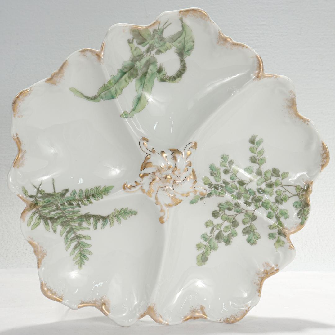 20th Century Set of 12 T&v Limoges Gilt Porcelain Oyster Plates with Green Transfer Ferns For Sale